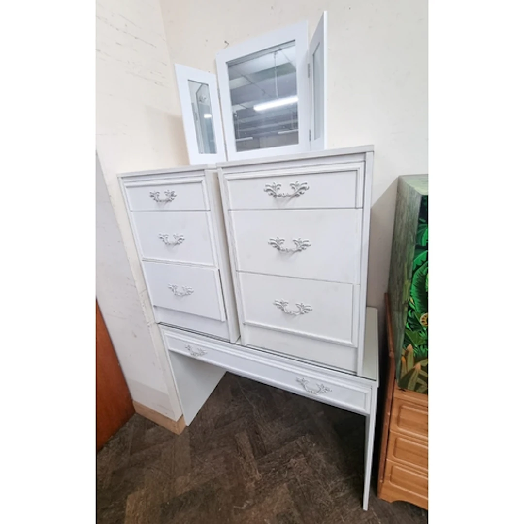 A modern white and gilt dressing table with freestanding tri...