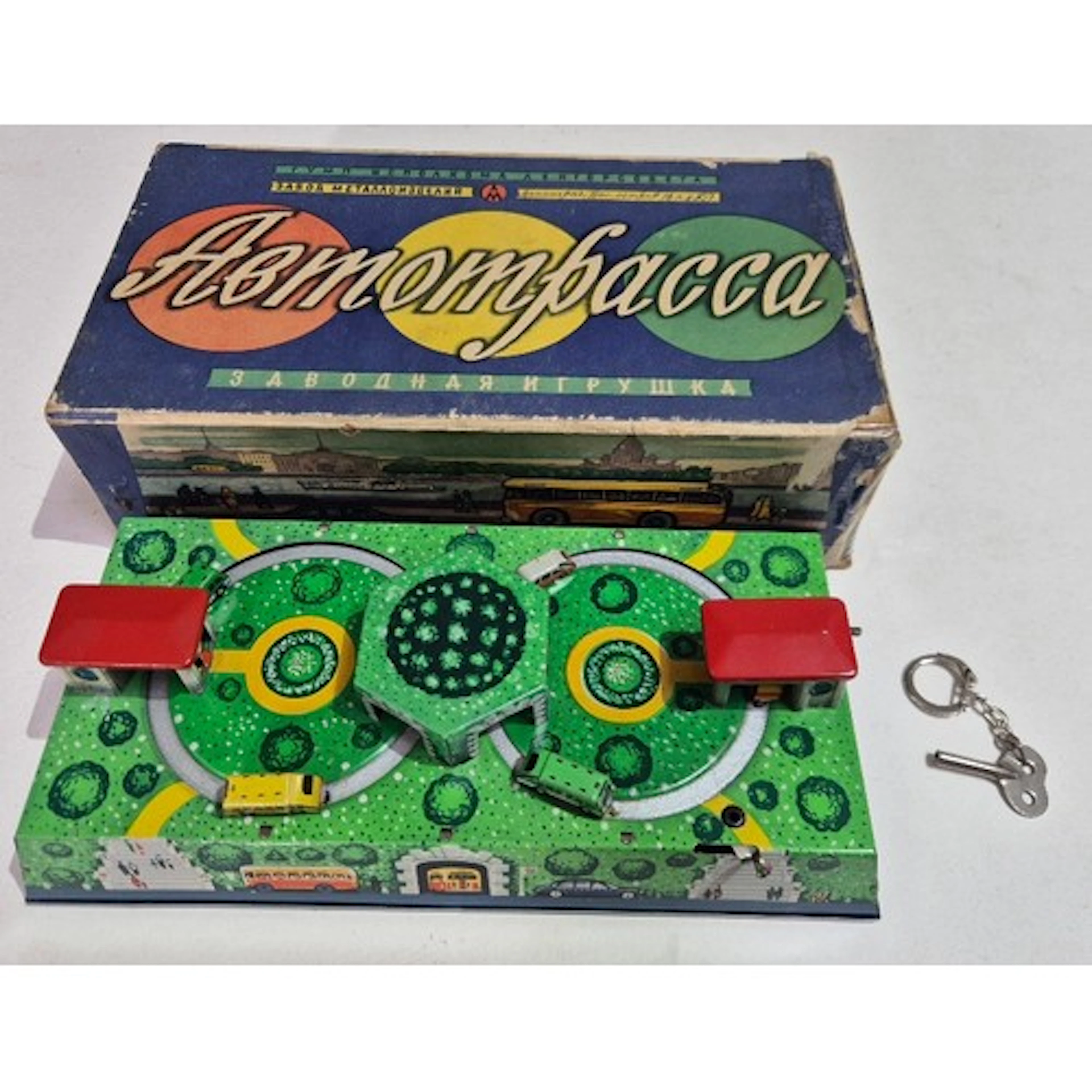 A vintage Russian tin plate bus station wind up tin toy, wit...