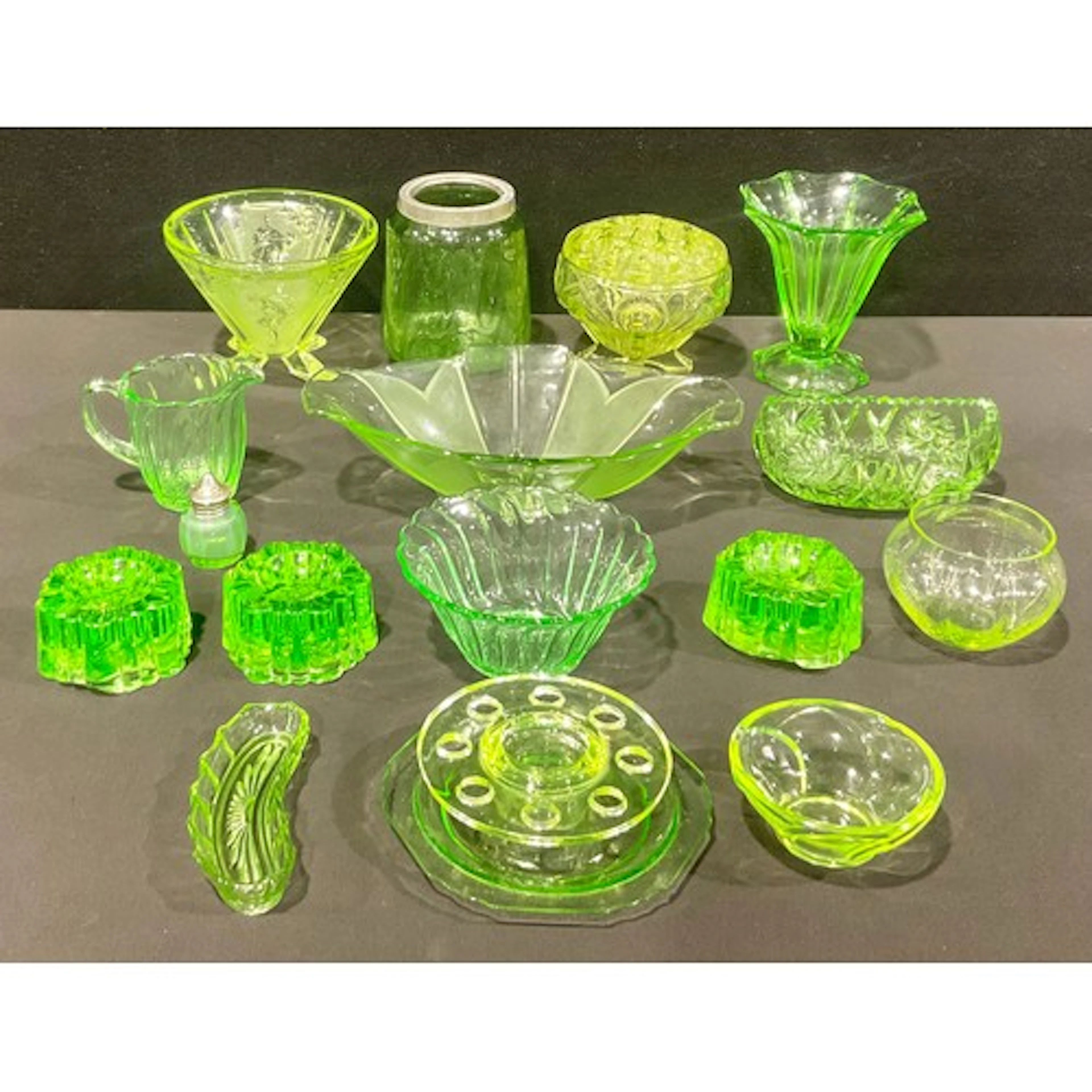 Uranium Glass - an Art Deco style fluted conical vase, press...