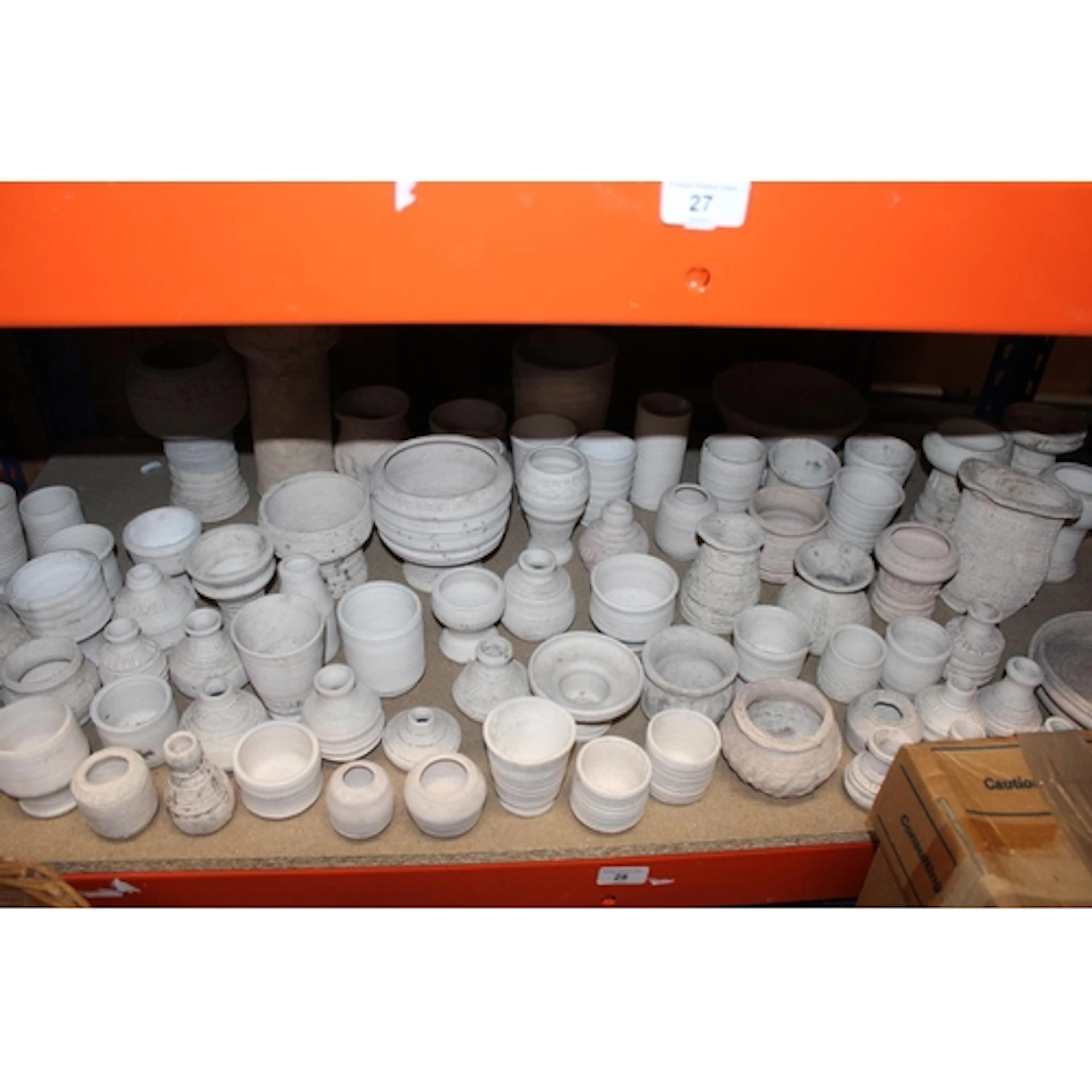 Shelf of unglazed Oxshott Pottery vases etc. Provenanc...
