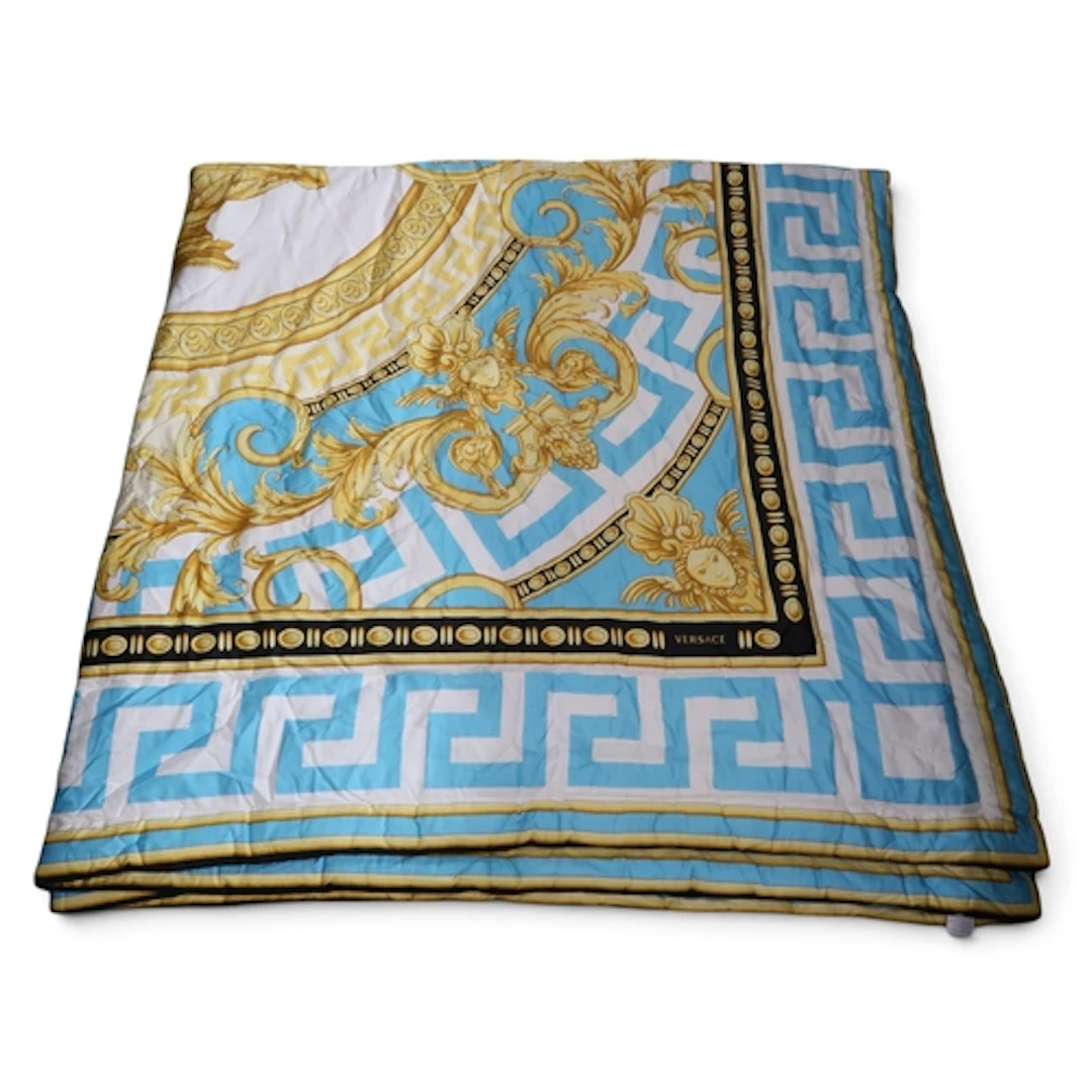 A Versace La Coupe des Dieux quilt in turquoise colourway A...