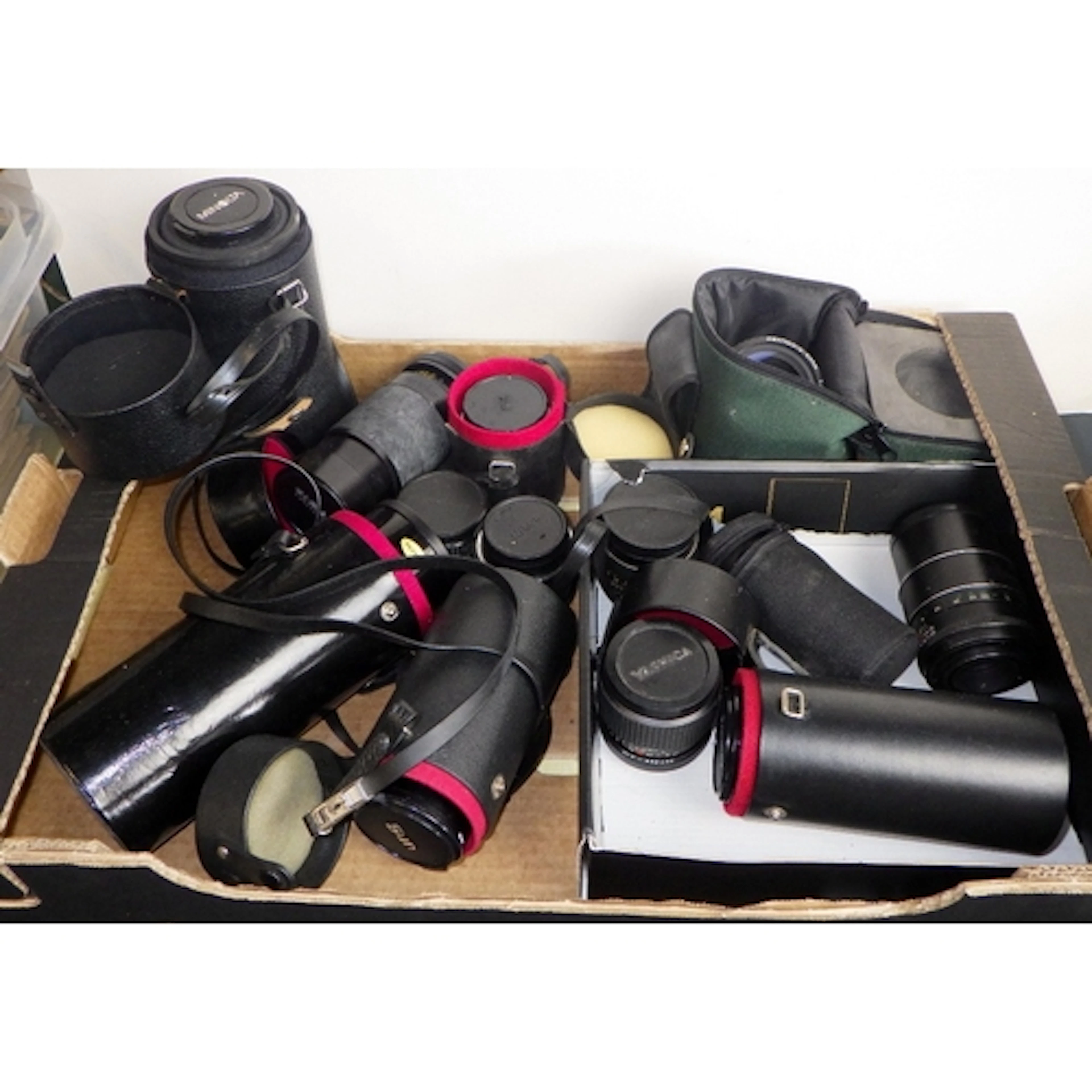 A qty of various camera lenses
