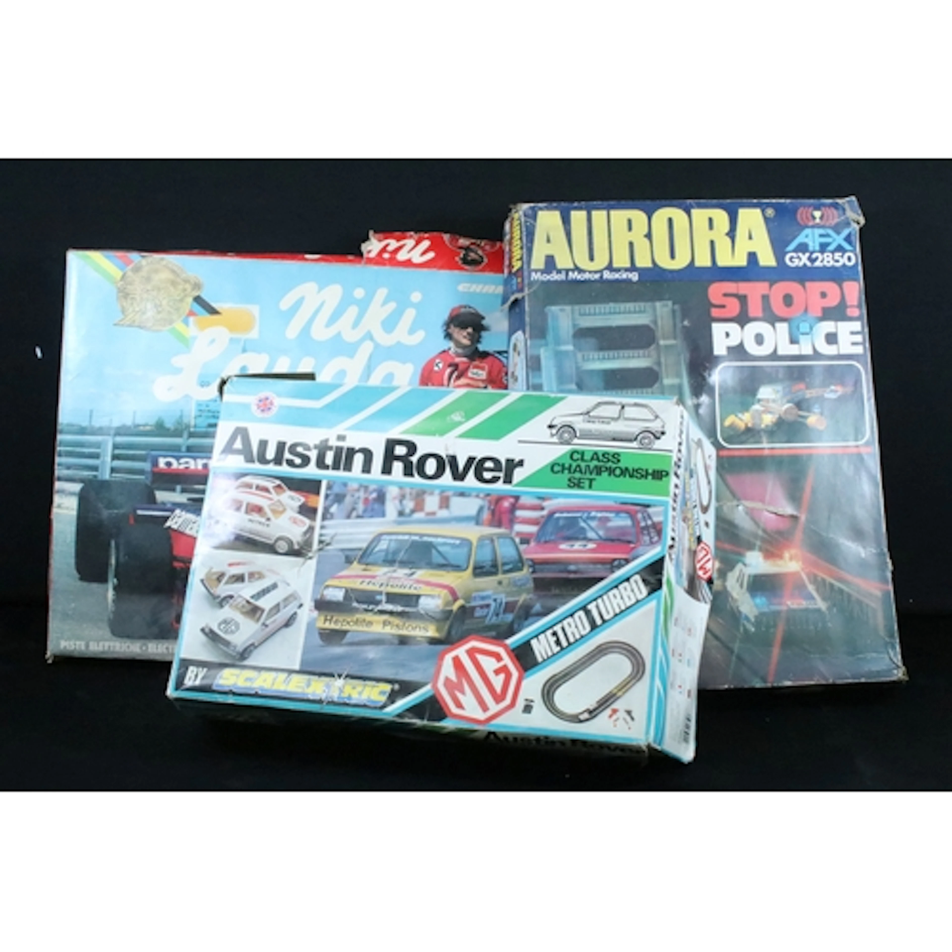 Three boxed slot car sets to include Scalextric C.652 Austin...
