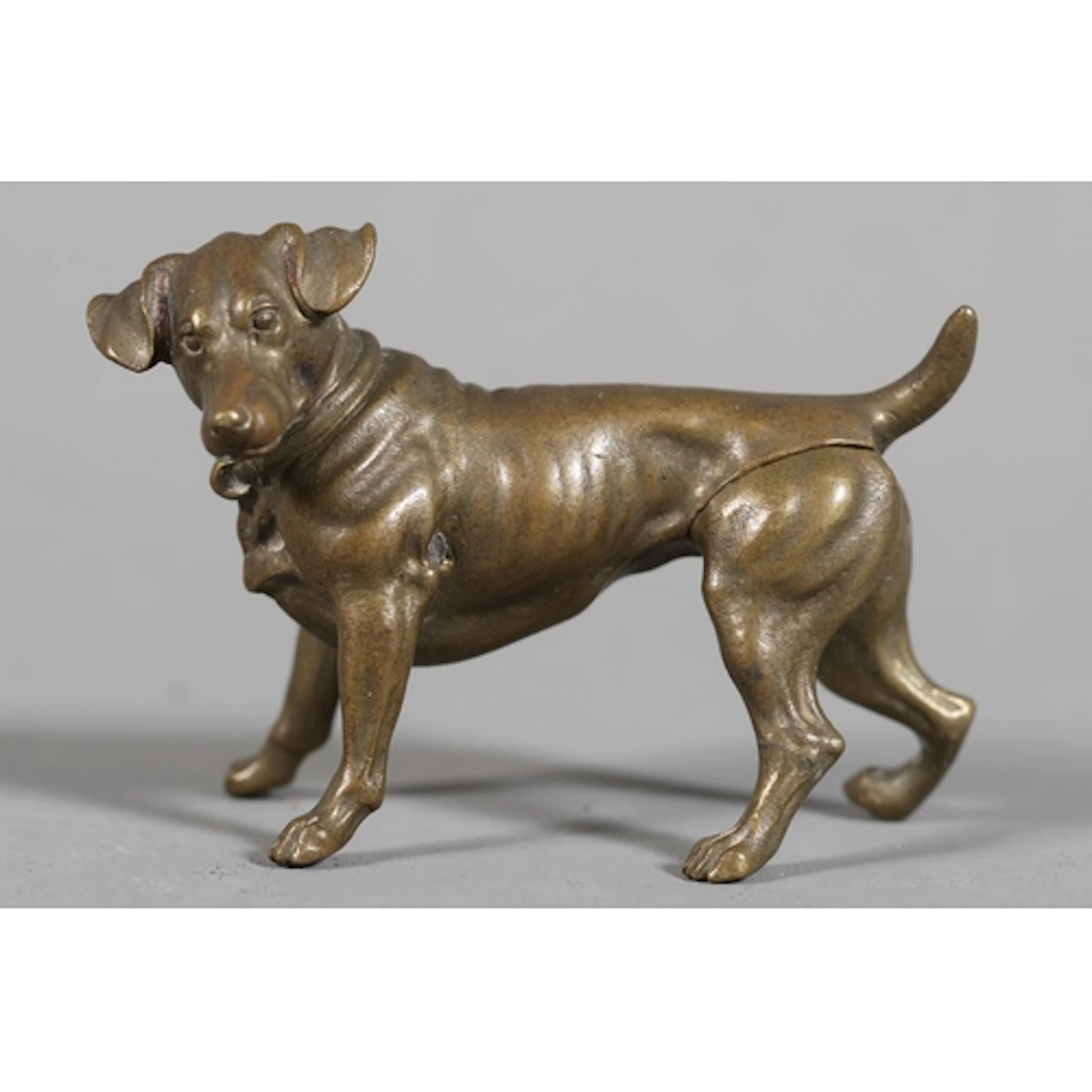 Miniature bronze, in the manner of Bergmann pointer type dog...