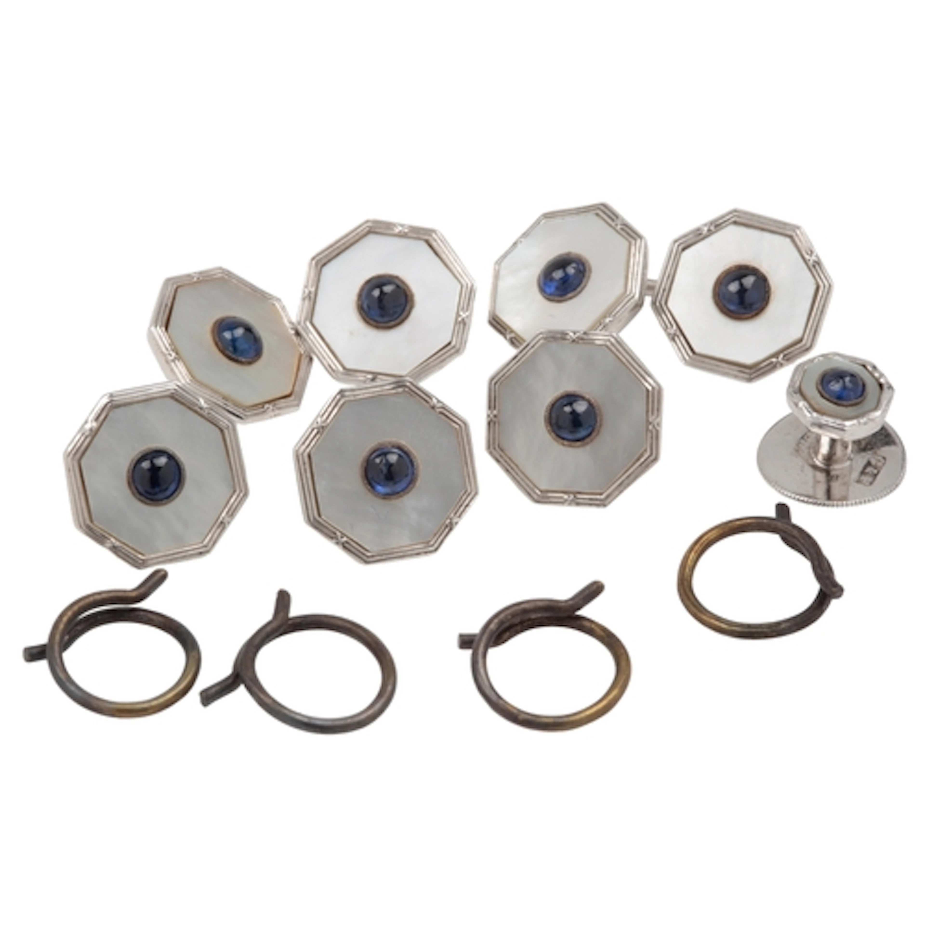 An mother of pearl and sapphire dress set, circa 1956, compr...