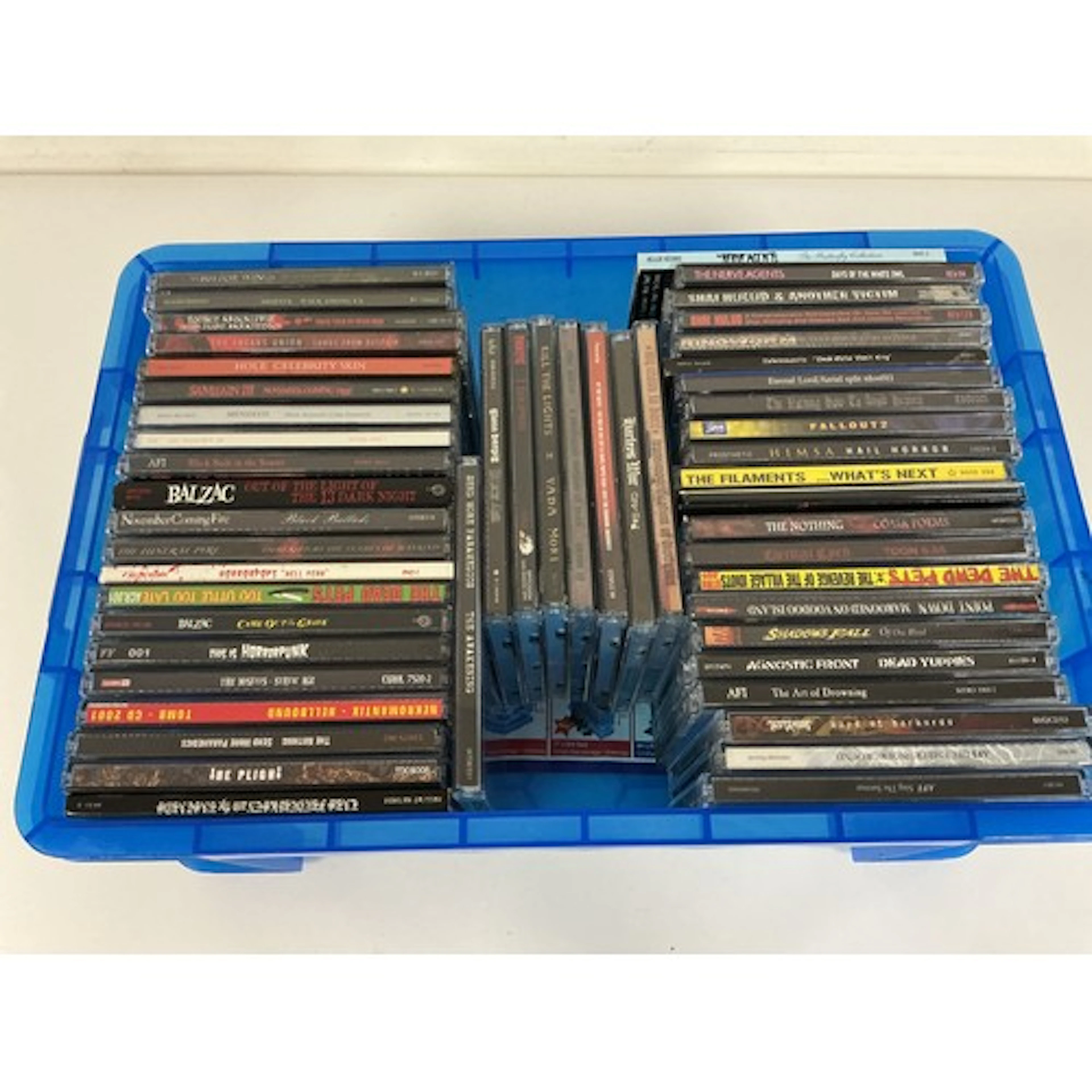 A collection of heavy rock CDs by various artists including ...