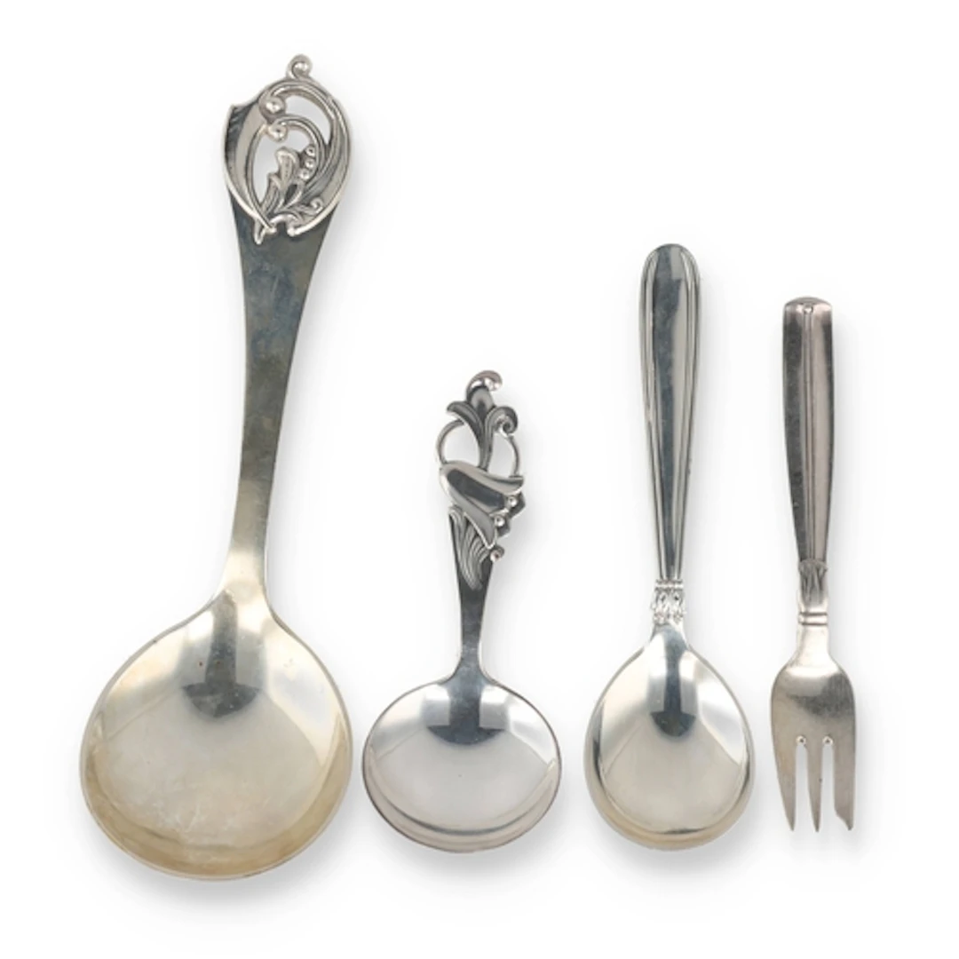 JENS F. ALBRECHTSEN: A DANISH SILVER HANDWROUGHT SPOON, COPE...