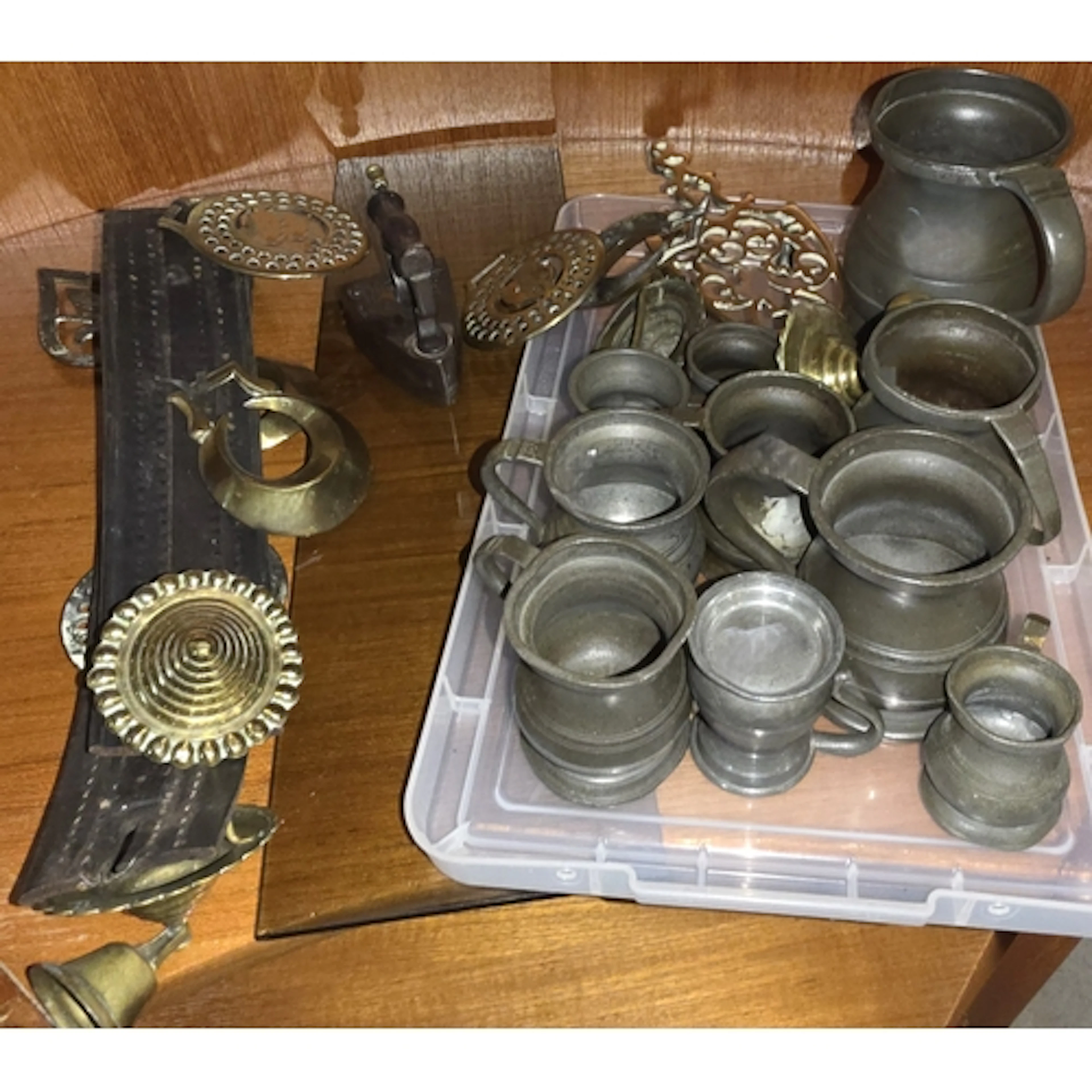 A collection of metalware inc. pewter mugs and measures; hor...