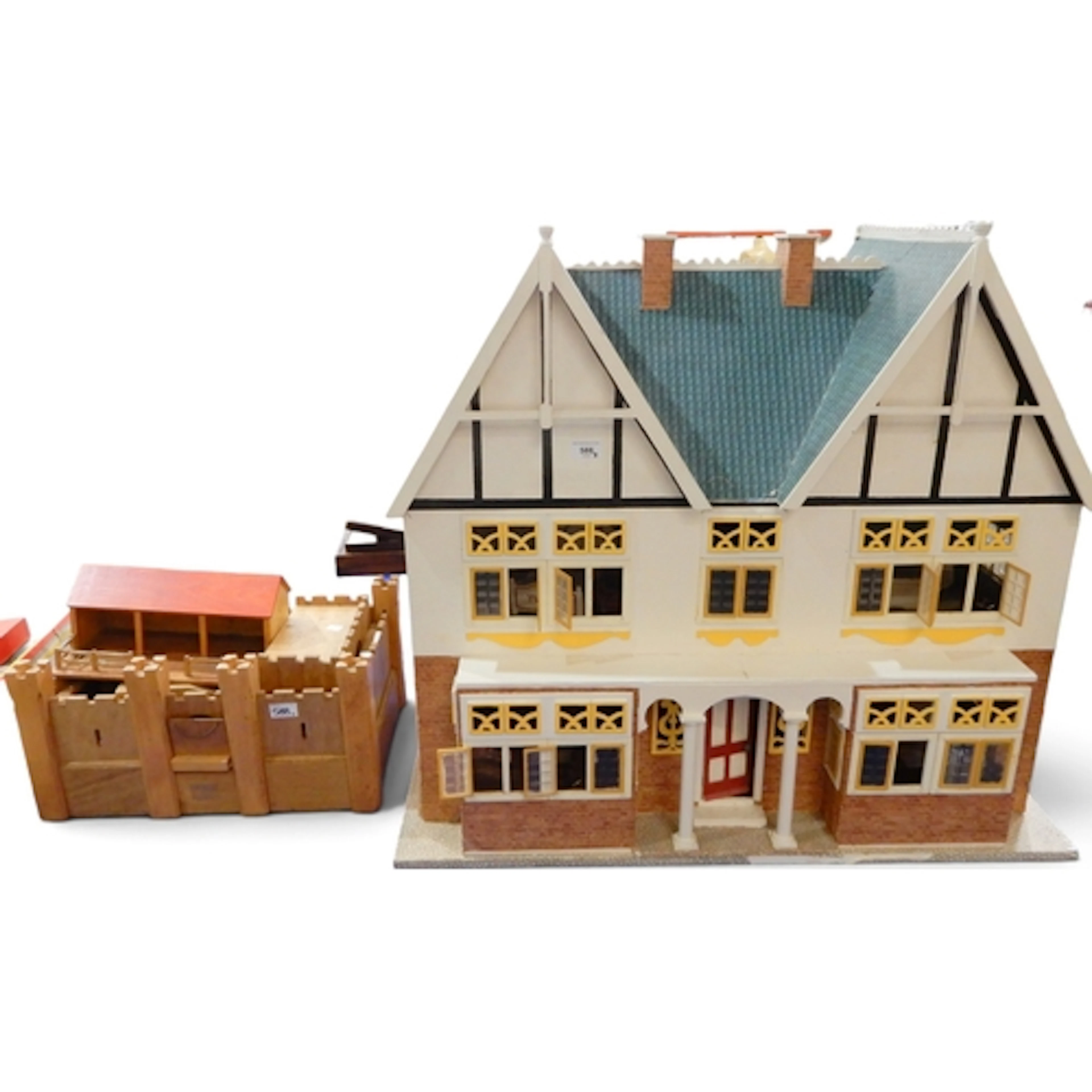 A large vintage dolls' house, with furnishings; with a Britw...