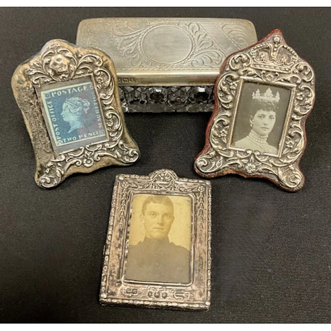A miniature silver mounted picture frame, with crown top, sc...