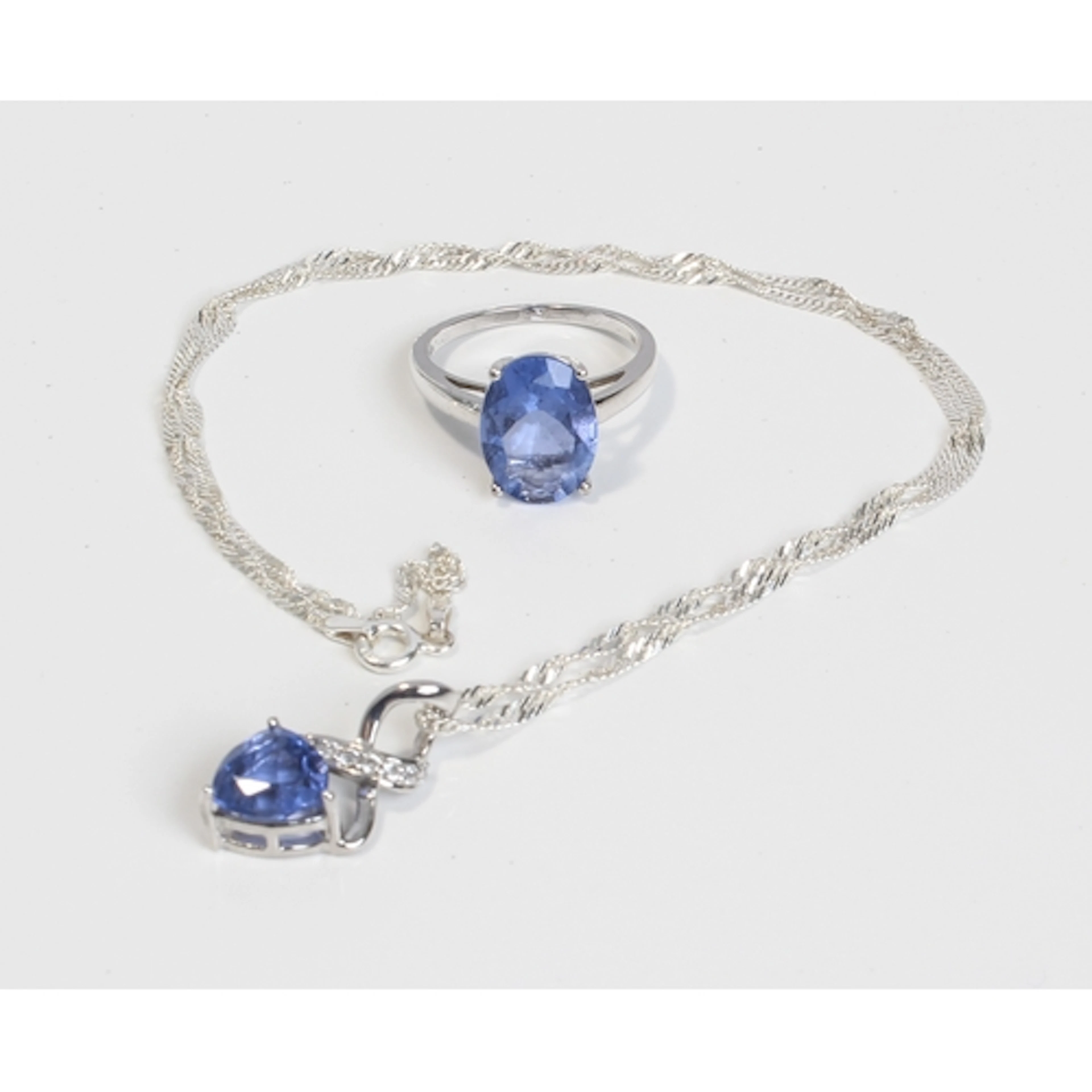A sterling silver and Colour Change Fluorite ring and matchi...