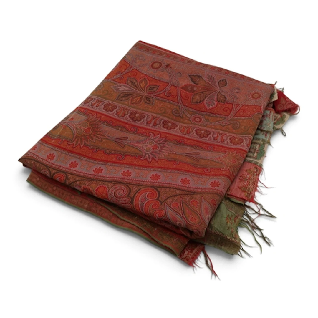 A long Paisley shawl woven with scrolling stems, boteh and p...