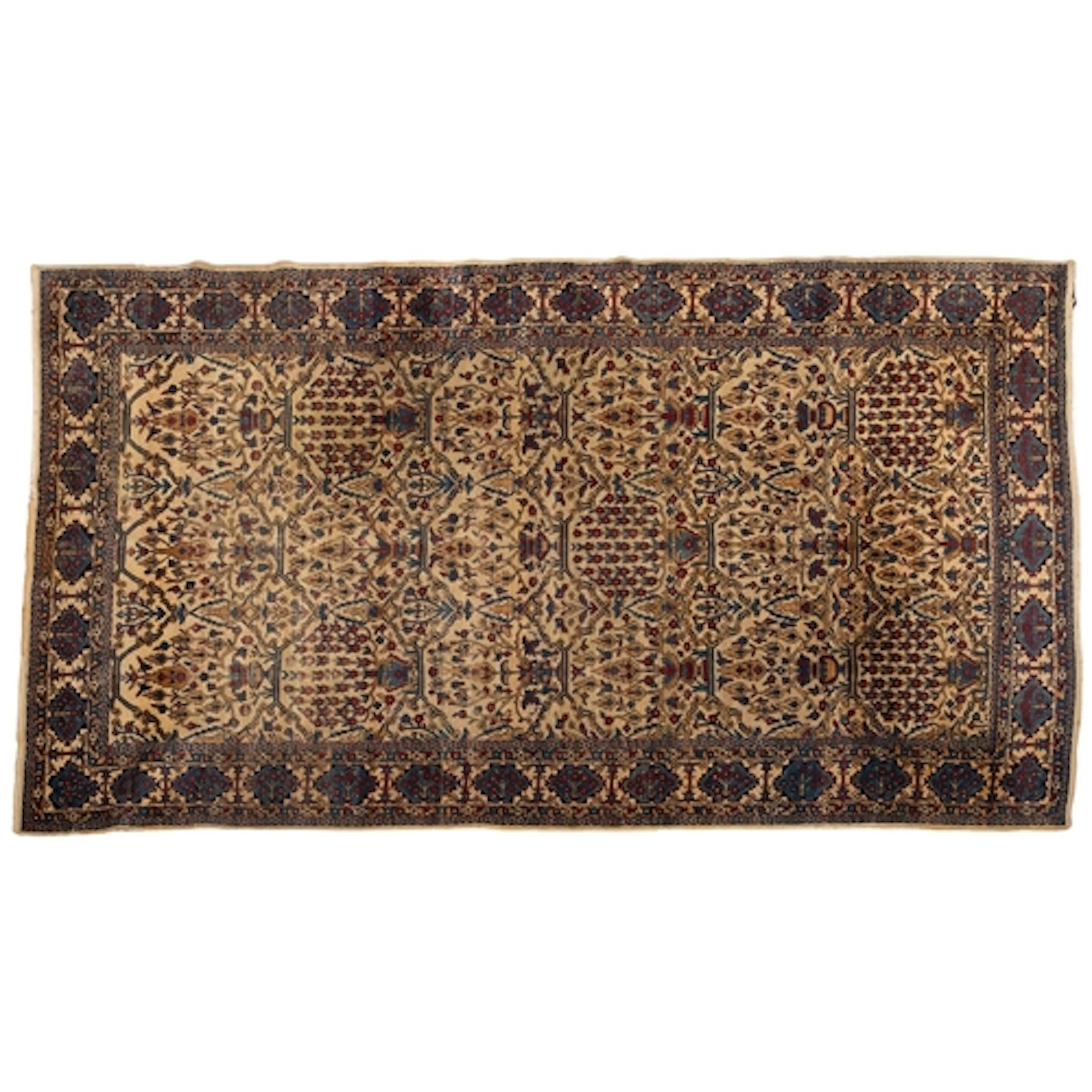 A Tabriz carpet, the ivory field with an all over design of ...