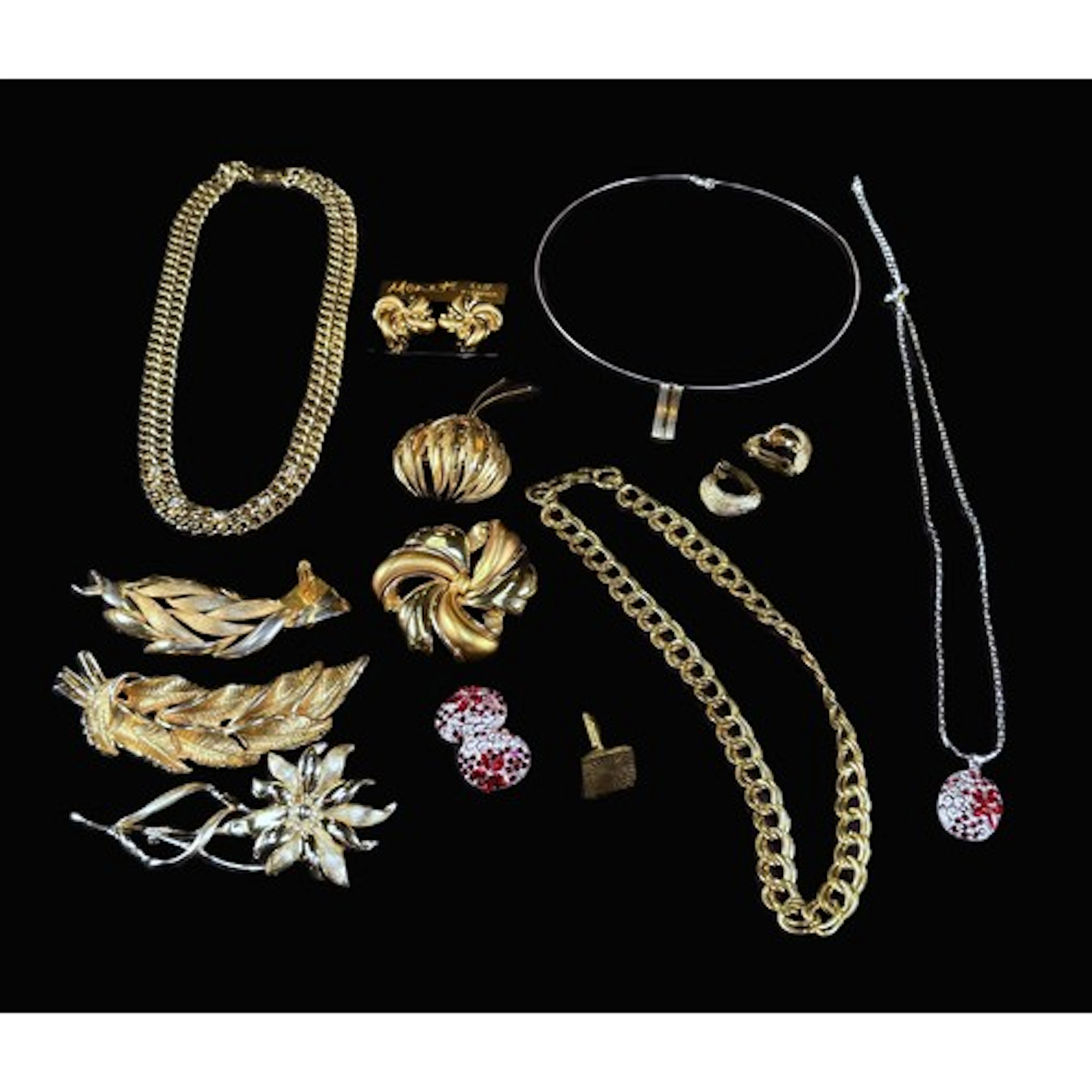 A Monet gilt necklace, earrings and brooch, other gilt brooc...