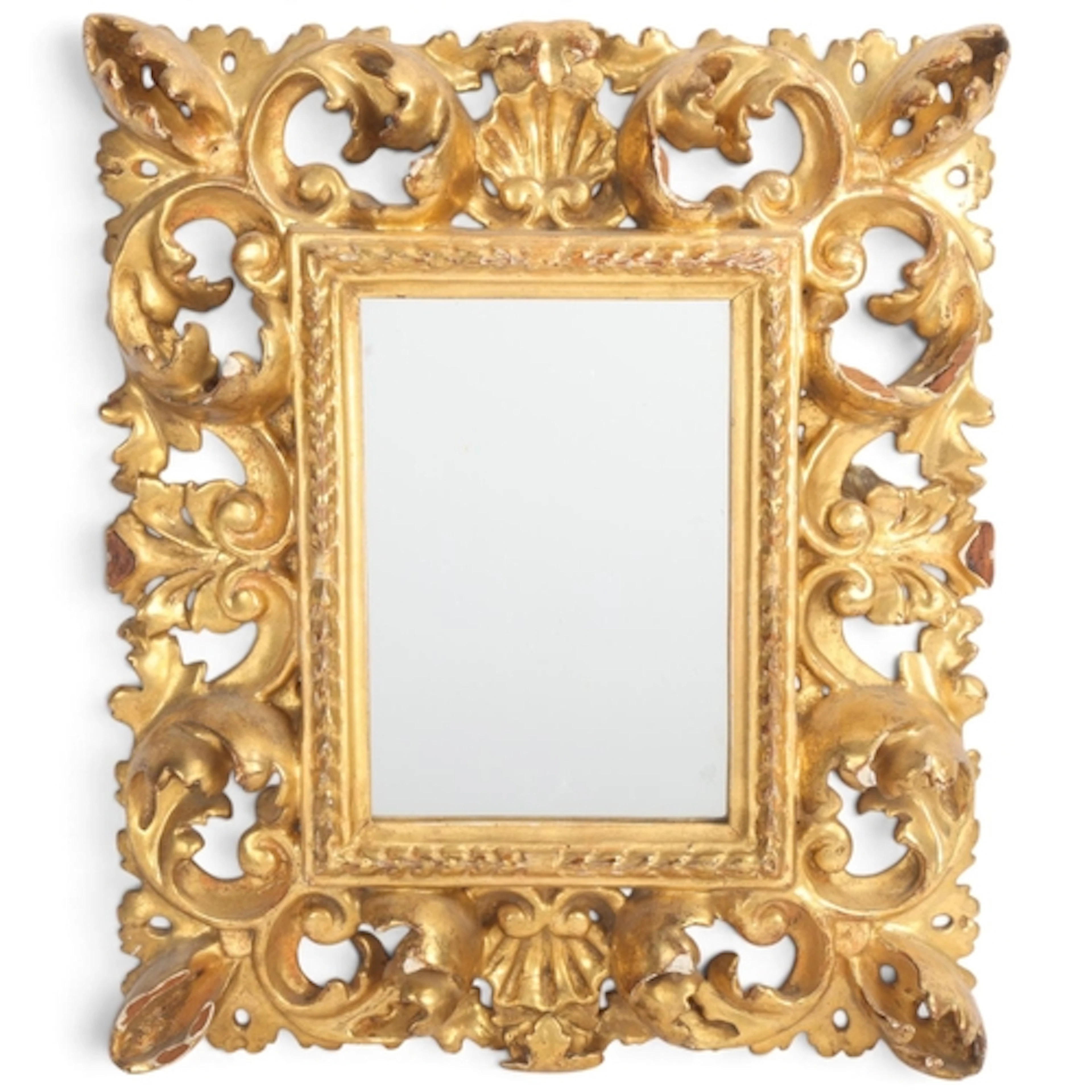 A small Florentine carved wood and gilt gesso wall mirror, f...