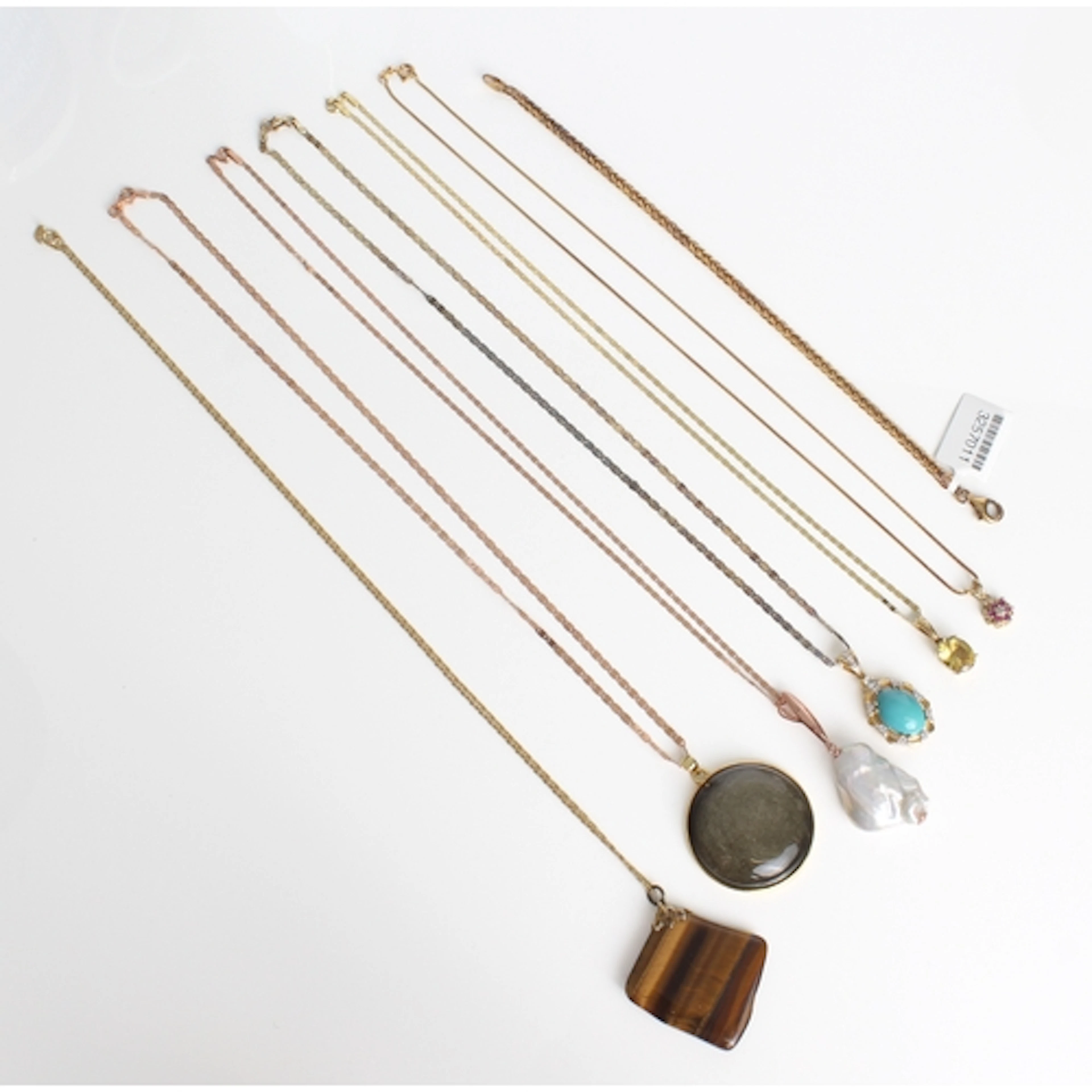 Six sterling silver and gemstone pendants - comprising a 0.2...