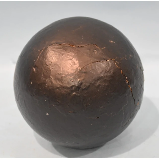 A cannon ball, 15cm diameter.