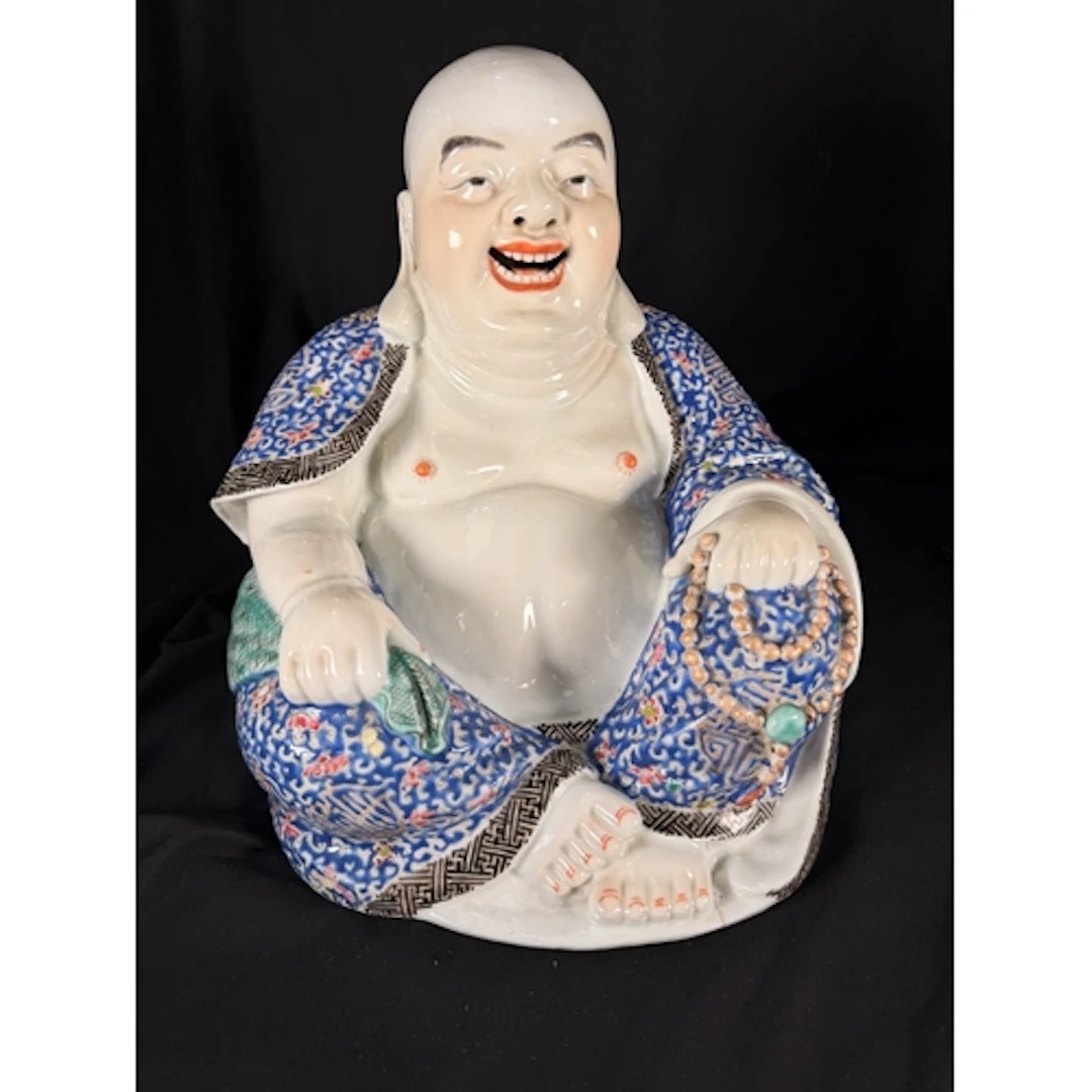 A large Chinese ceramic figure of Ho Tai, the Laughing Buddh...