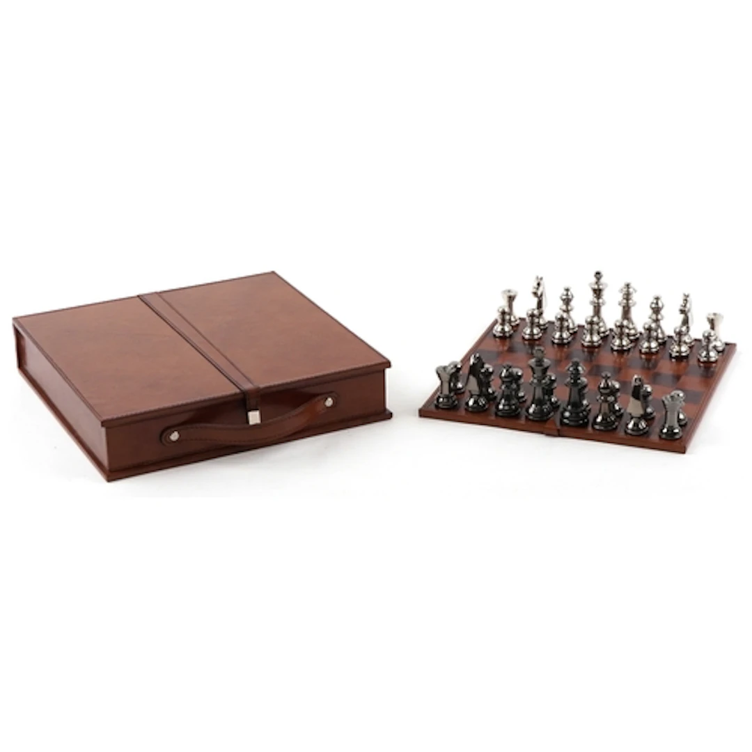 Polished metal chess set with suede interior, 7cm H x 33cm W...