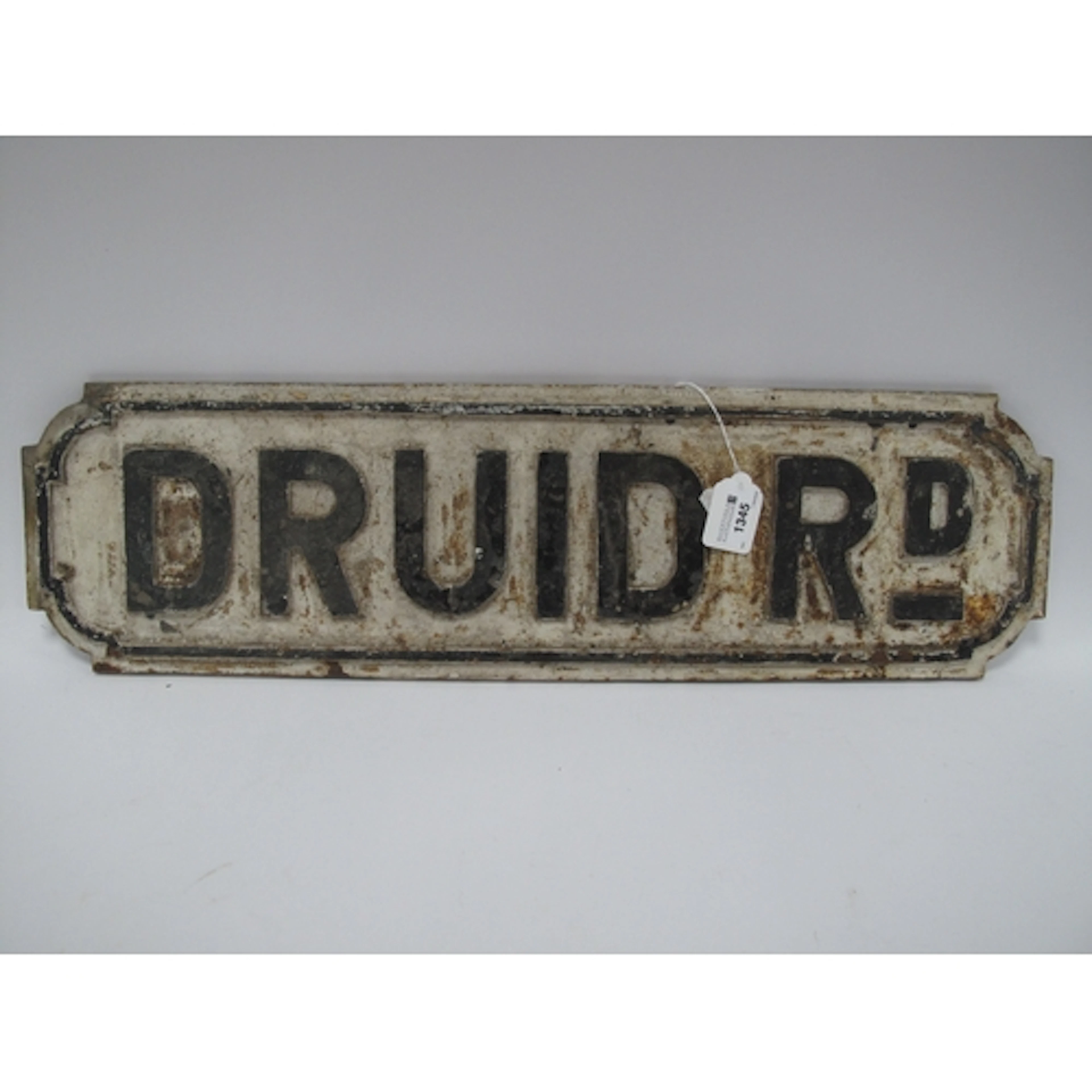 A vintage reclaimed white and black cast iron street sign, "...