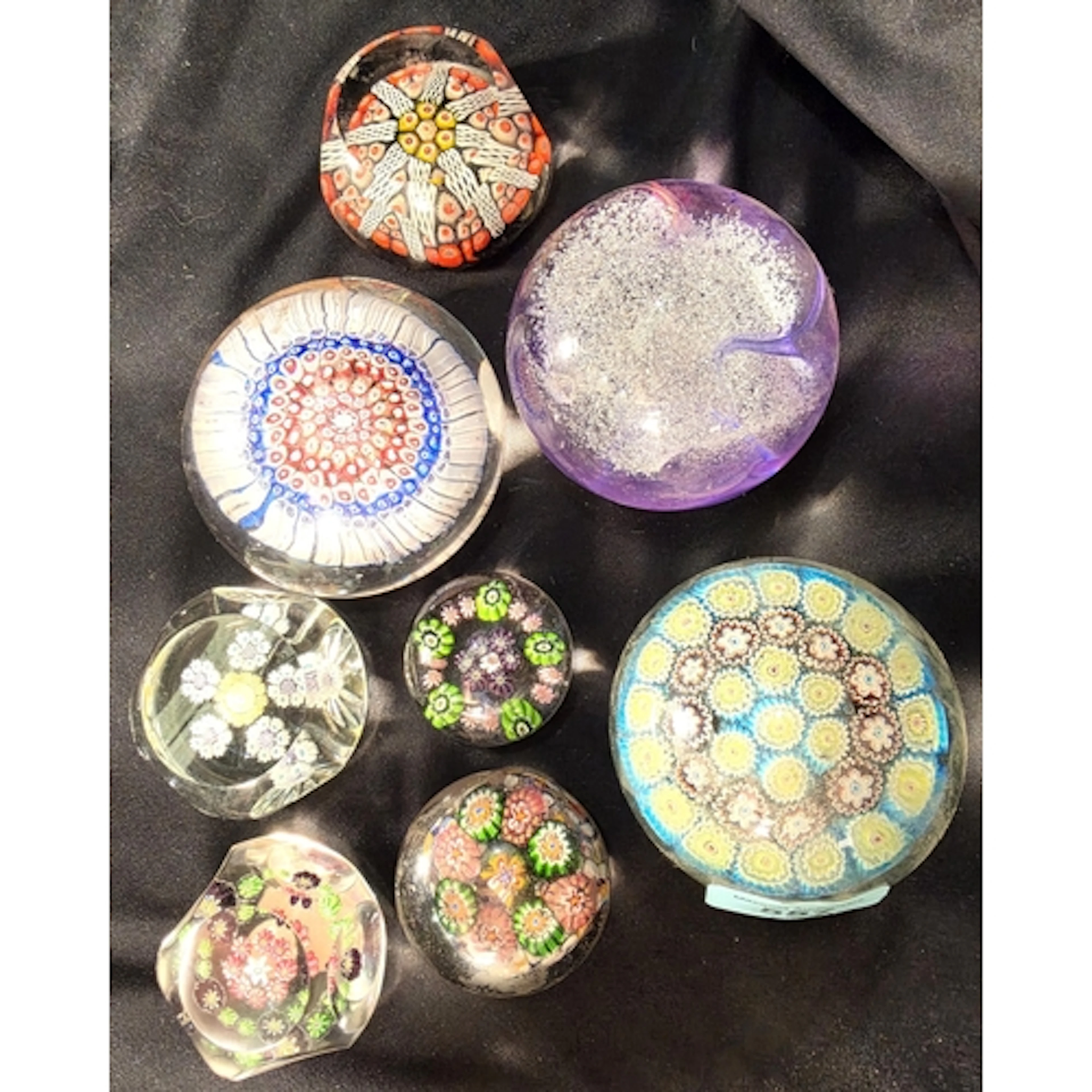 A small Clichy style paperweight, other similar paper weight...