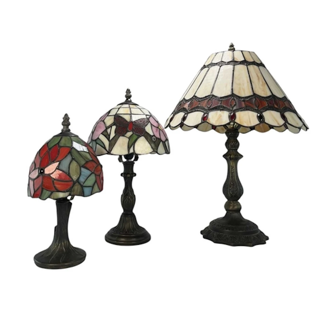 A selection of three later 20th century Tiffany style table ...