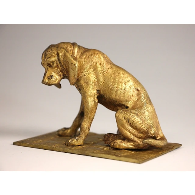 A cold painted cast metal animalier model of a melancholic d...