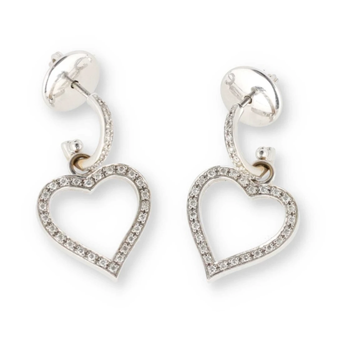 THEO FENNELL: A PAIR OF 18 CARAT WHITE GOLD DIAMOND HEART EA...