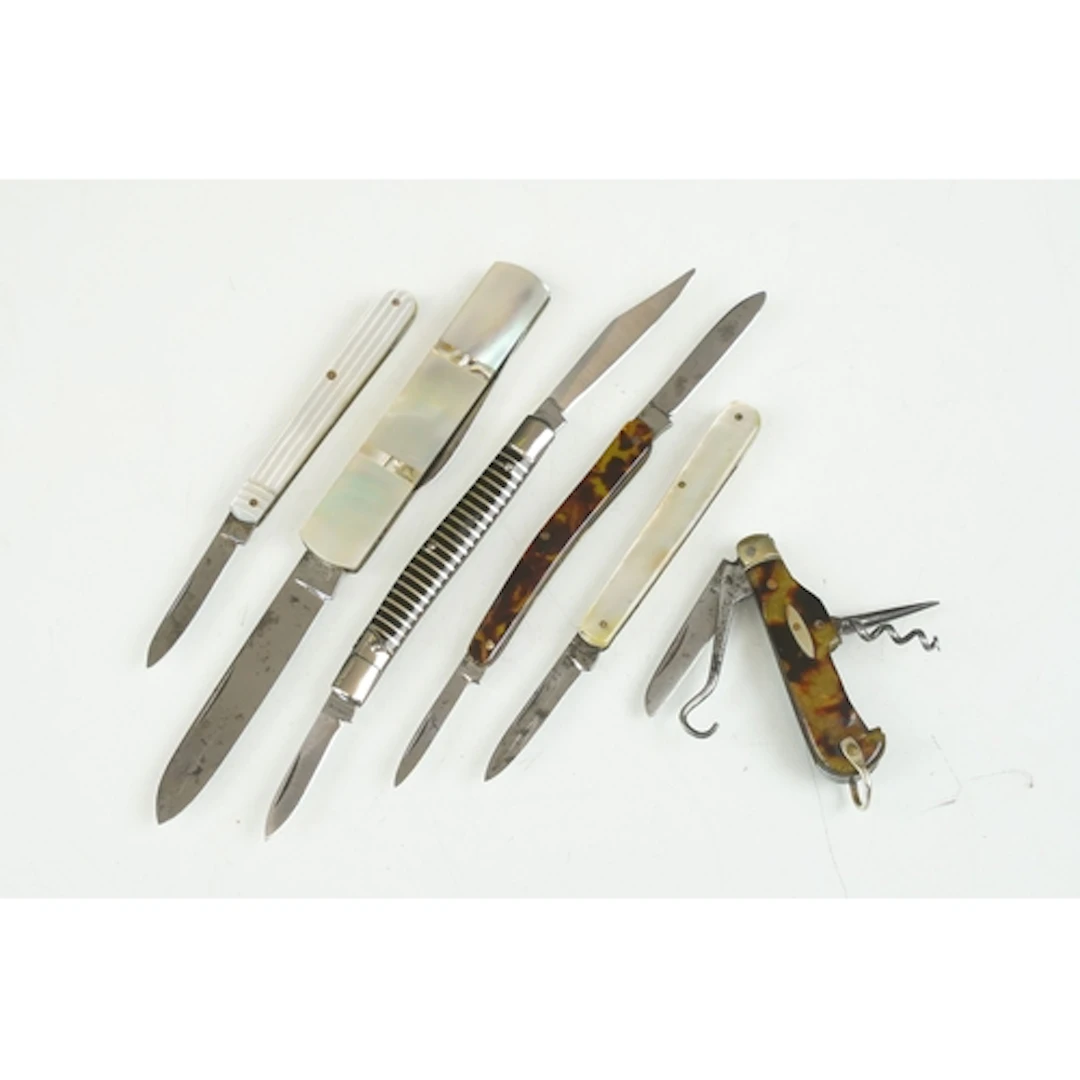 Collection of six 20th century pocket knives, to include: th...