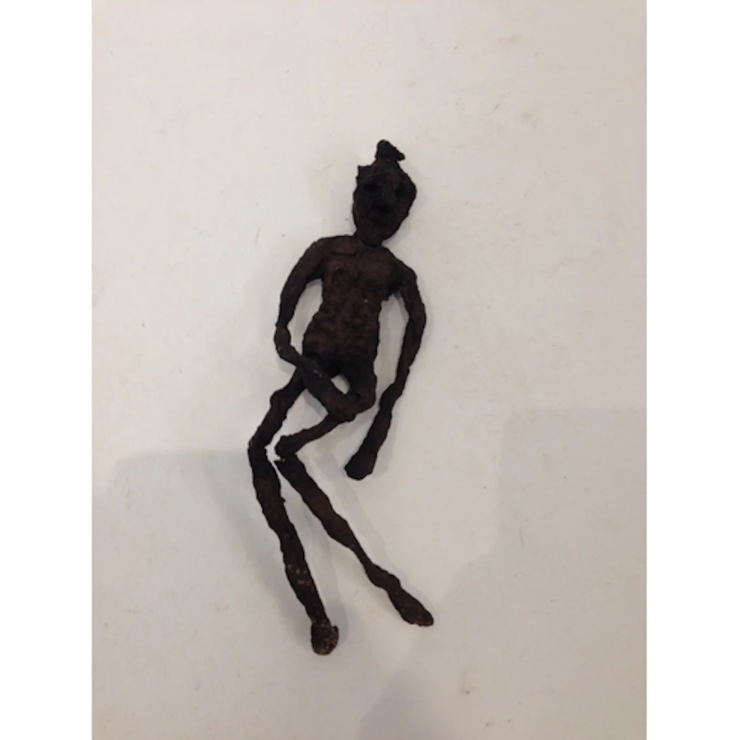 An early 19th century 'Poppet' Doll, stylized female form ma...