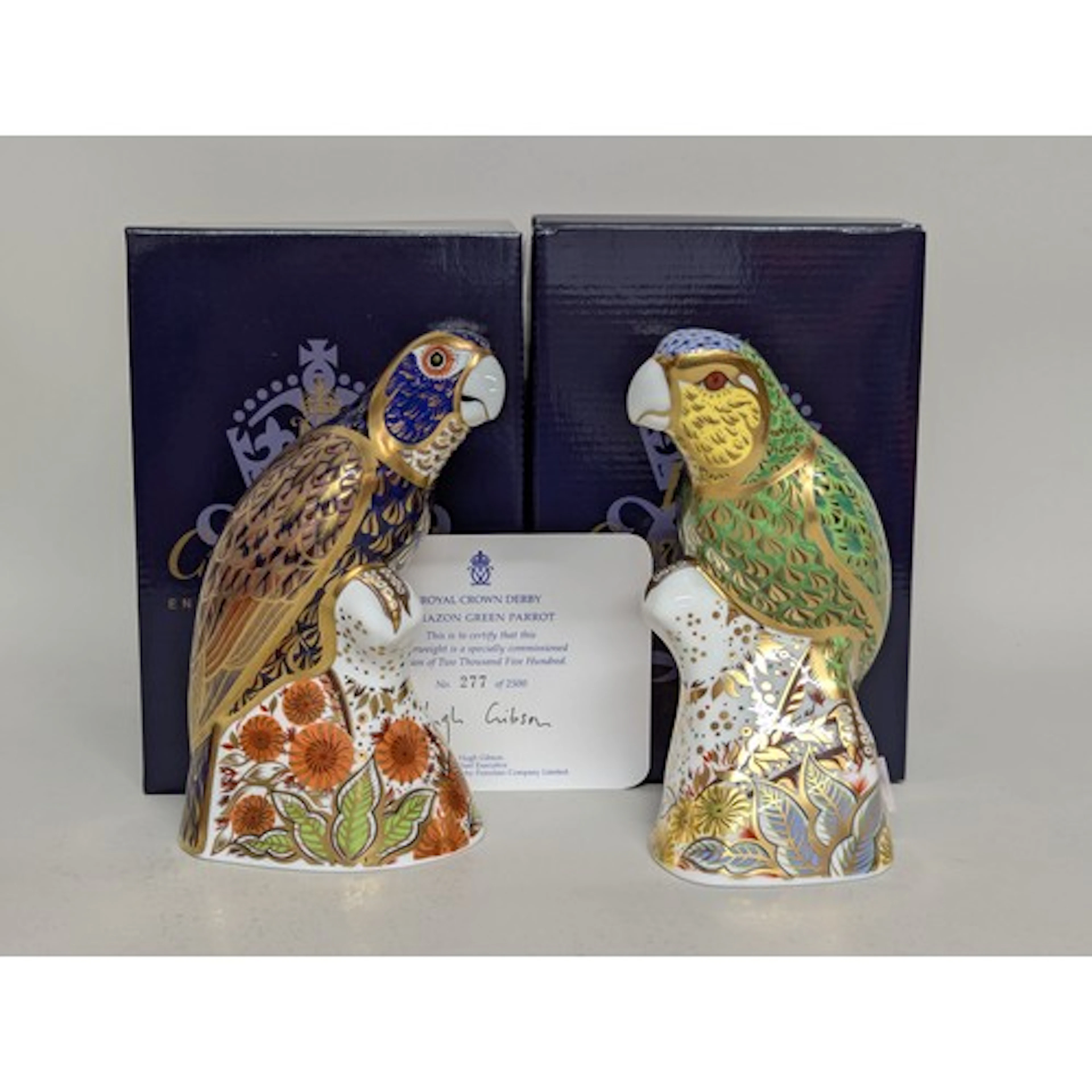 A Royal Crown Derby paperweight, Amazon Green Parrot, specia...