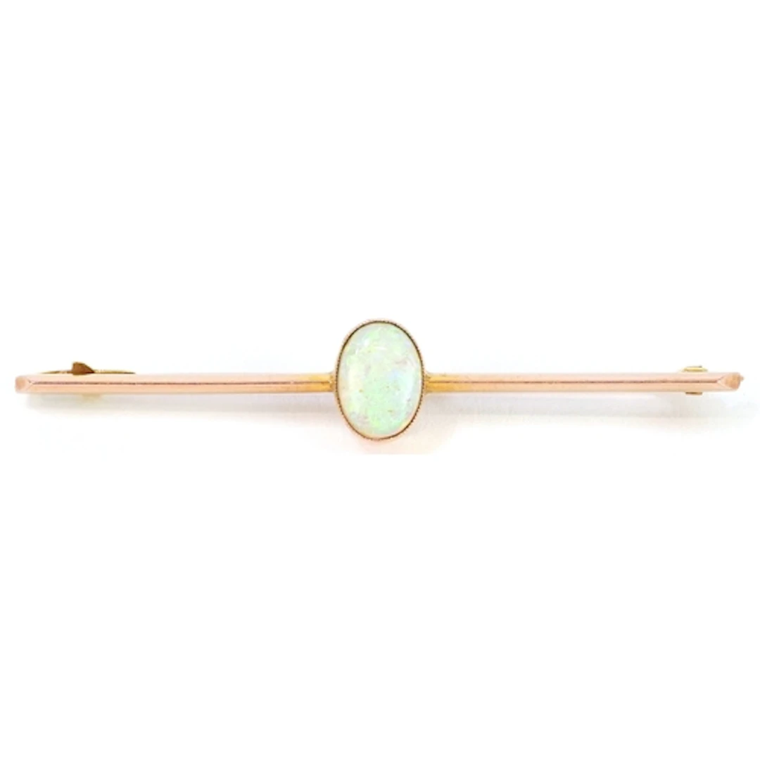 9ct gold opal bar brooch, 5.7cm wide, 3.1g.