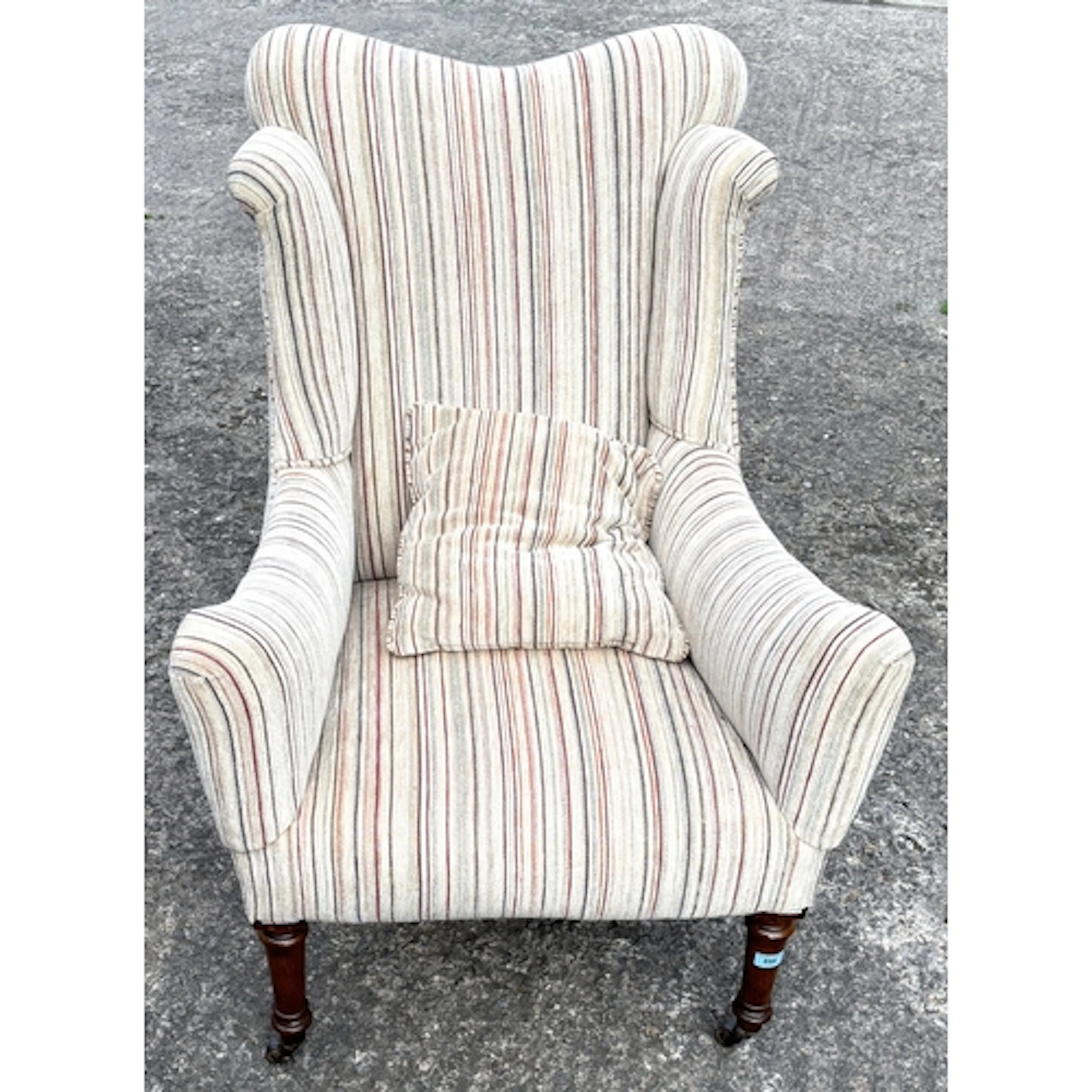 1920's re-upholstered wing back armchair on turned mahogany ...