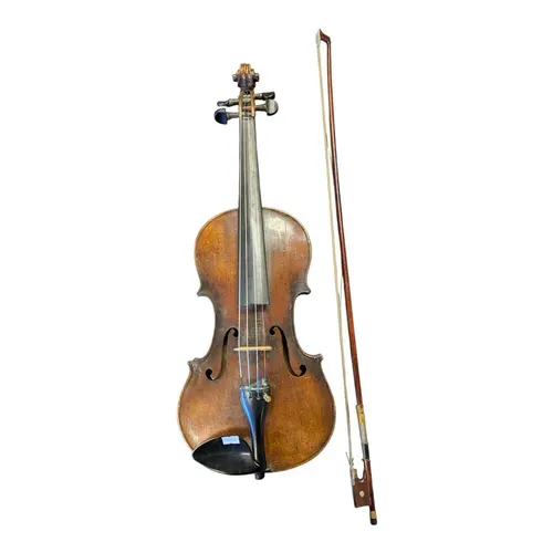 An early 20th mahogany violin & bow. The violin having e...