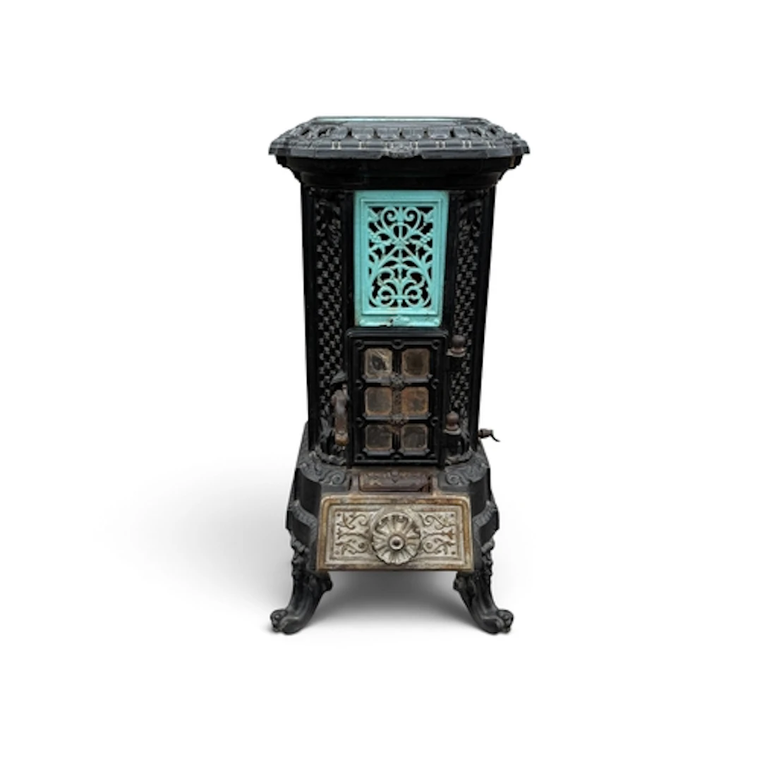 A LATE 19TH CENTURY FRENCH CAST IRON GODIN STOVE Painted bla...