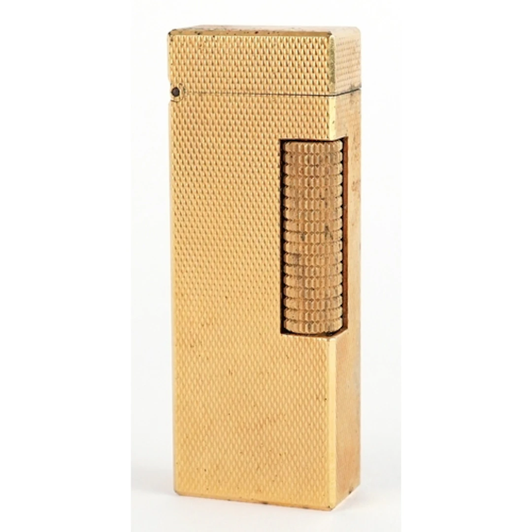 Dunhill gold plated engine turned pocket lighter, 6.4cm high...