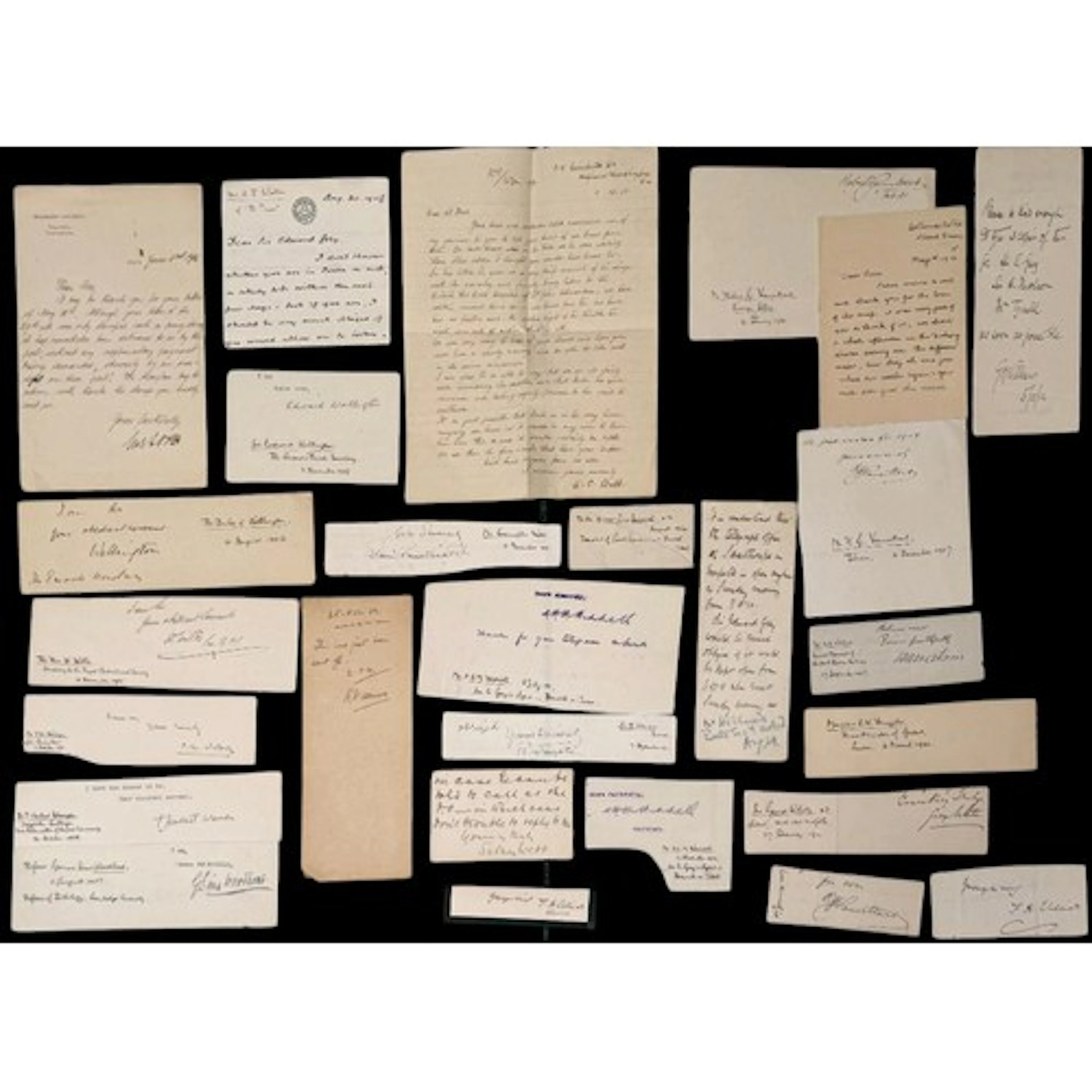 A collection of clipped ink autographs of prominent people, ...