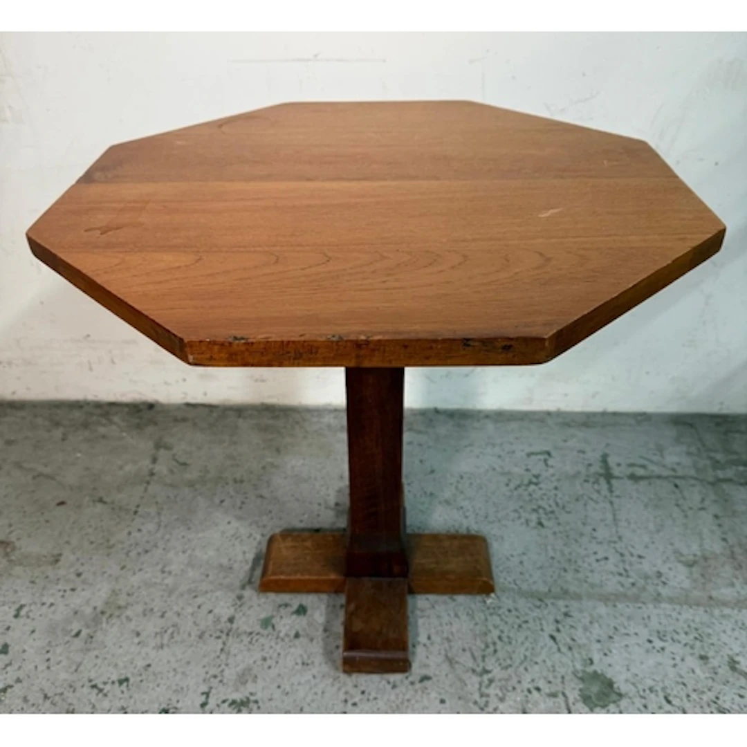 An Arts and Craft style side table, octagonal top and cross ...
