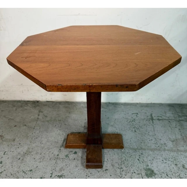 An Arts and Craft style side table, octagonal top and cross ...