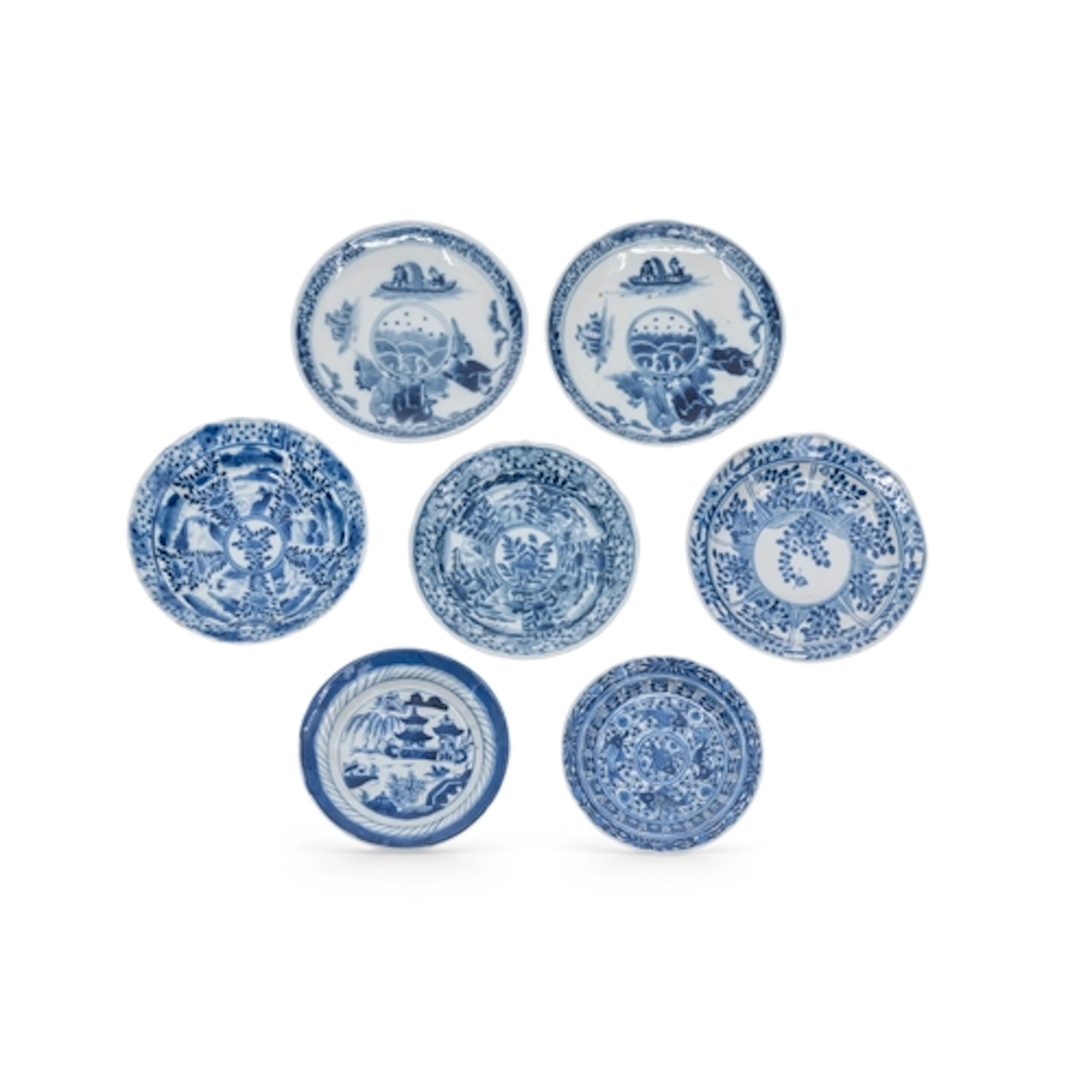 A GROUP OF SEVEN SMALL CHINESE BLUE AND WHITE DISHES QING DY...