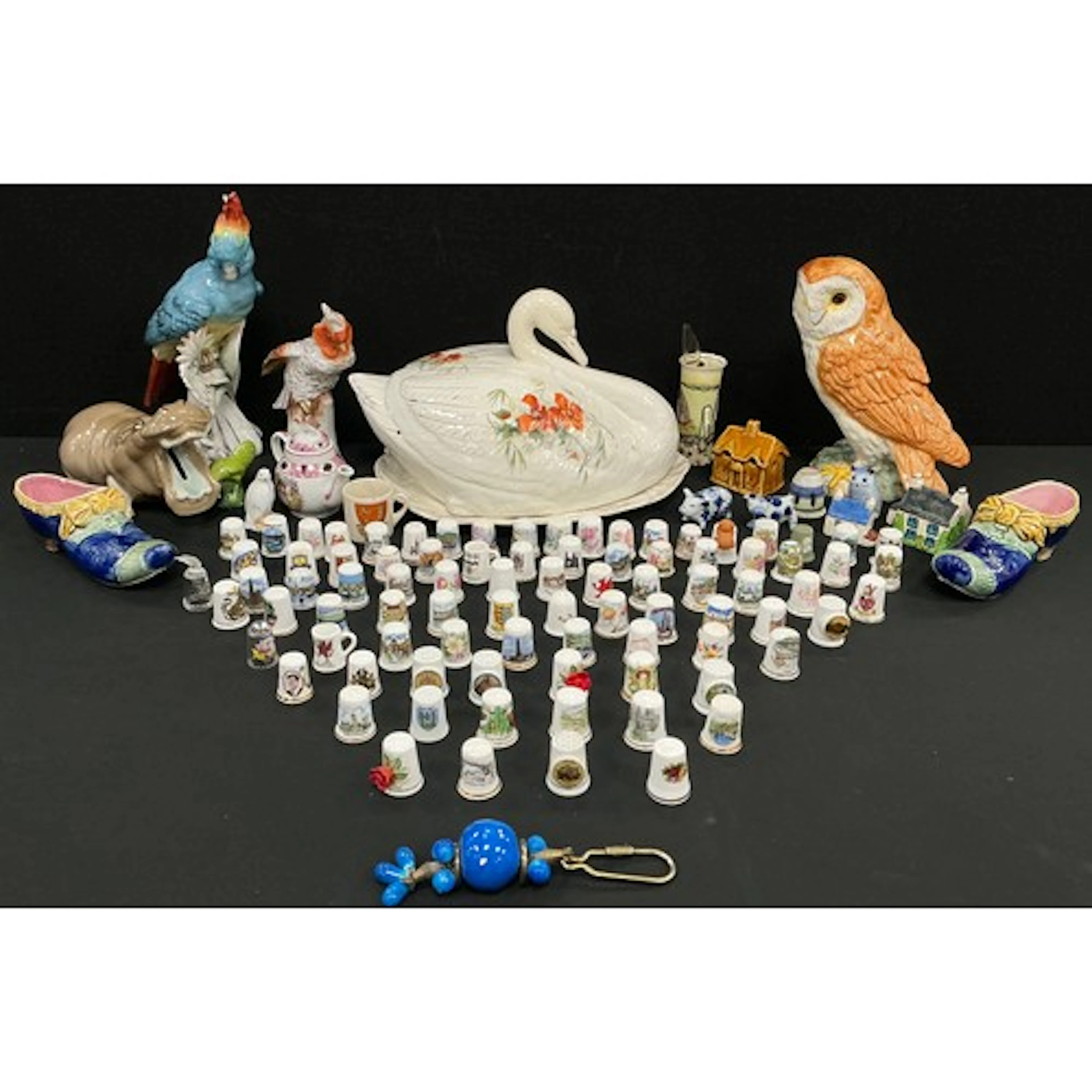 Ceramics - two ceramic figures of exotic birds, the parrot i...
