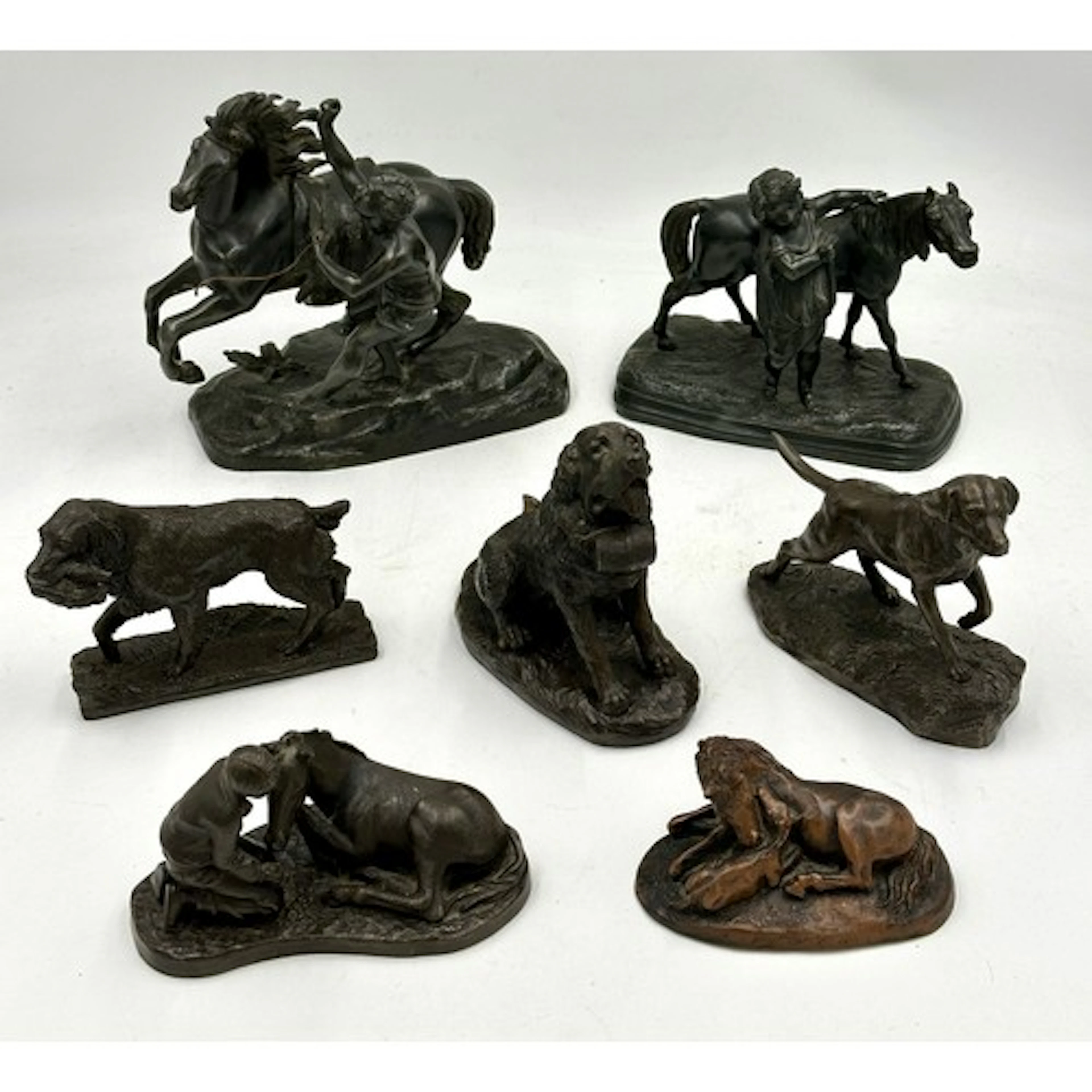 Two metal replica sculptures one of a Marly horse after scul...