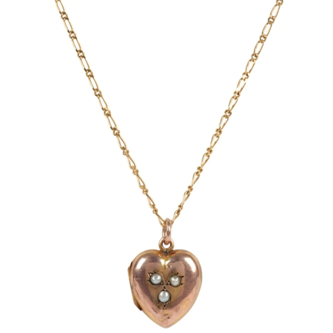 A gold and seed pearl locket on chain, circa 1906 and later,...
