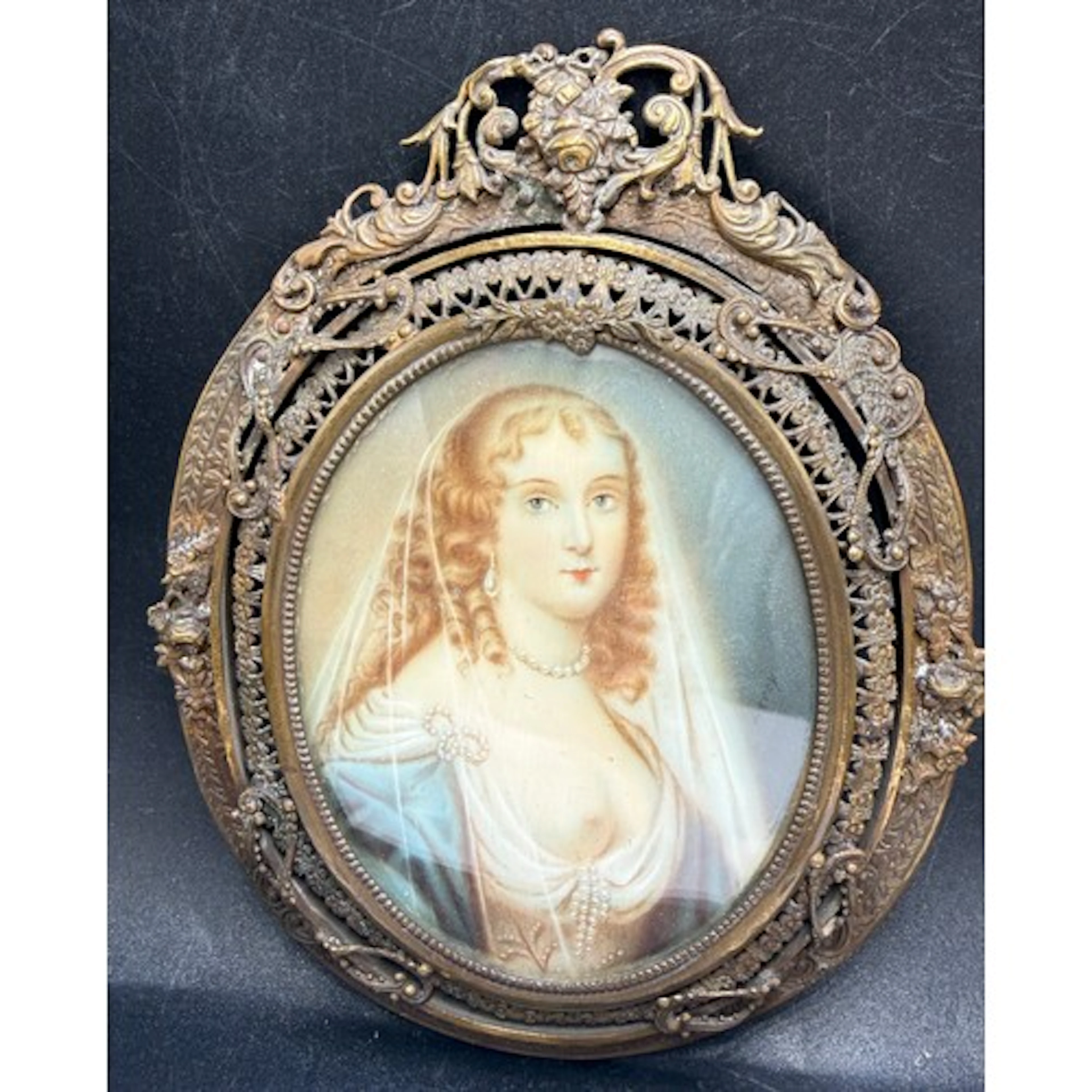 Oval ormolu mounted miniature painting on ivory possibly dep...