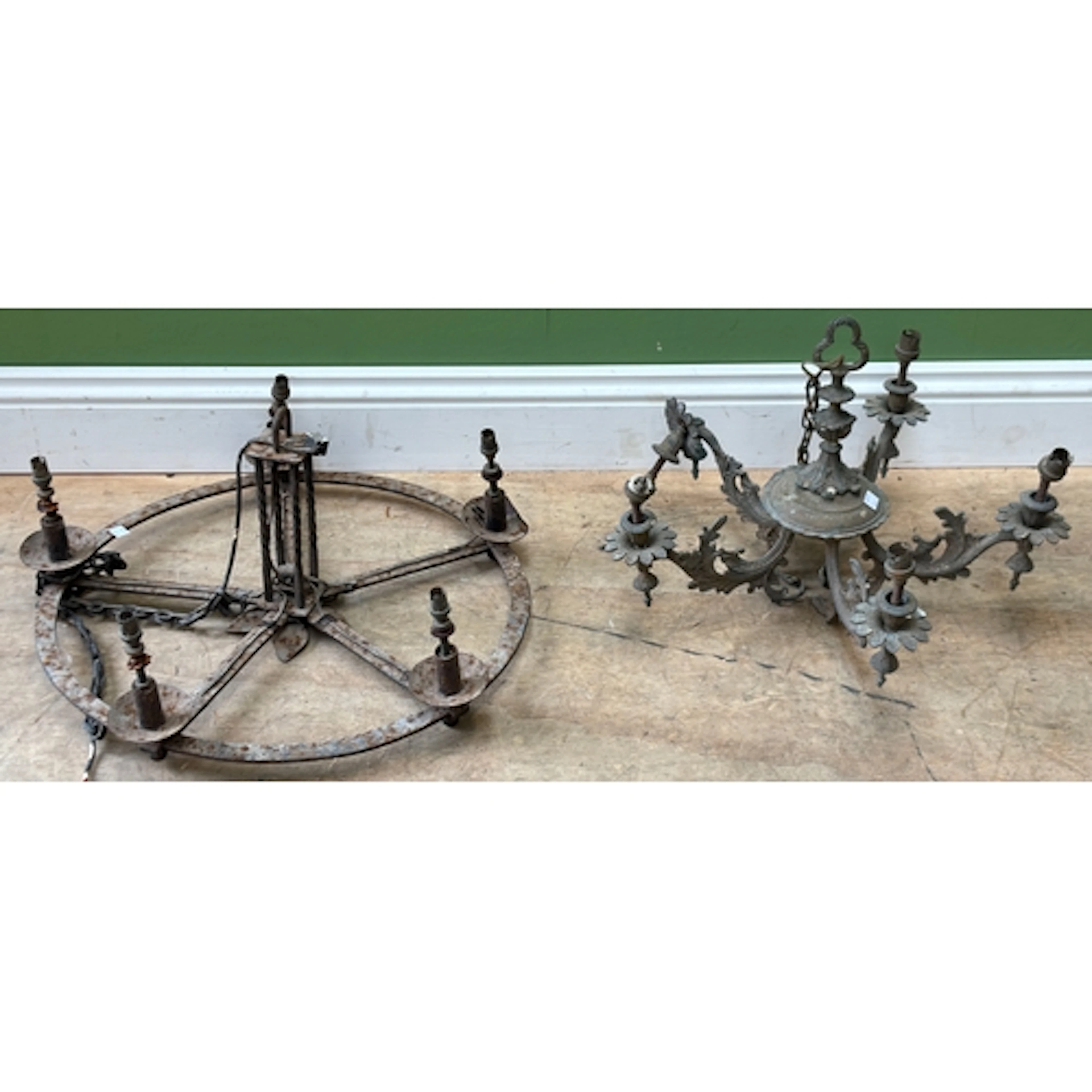 A wrought iron five fitting chandelier, approx. 60cmD; toget...