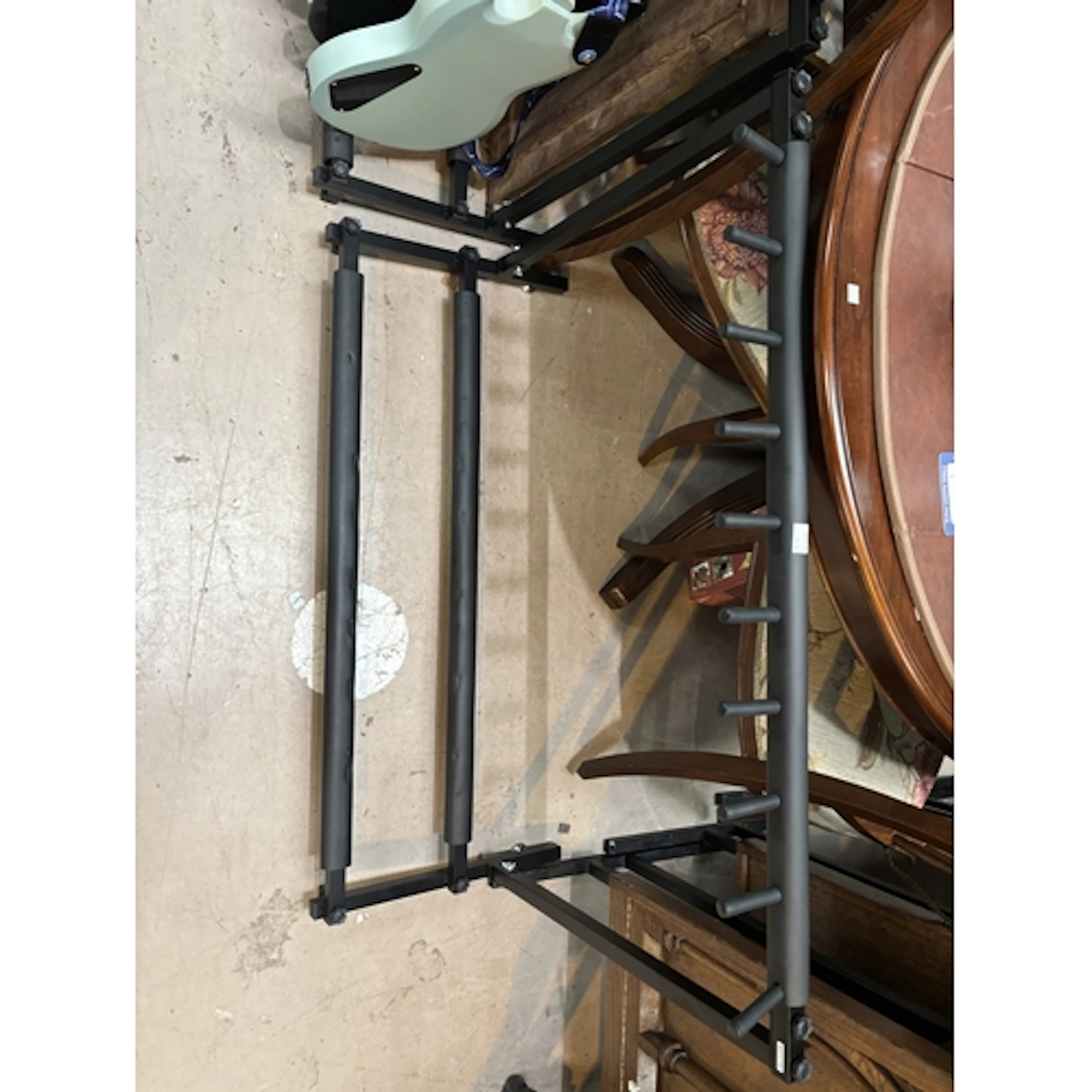 2 Guitar stands with space for 9 guitars on each.
