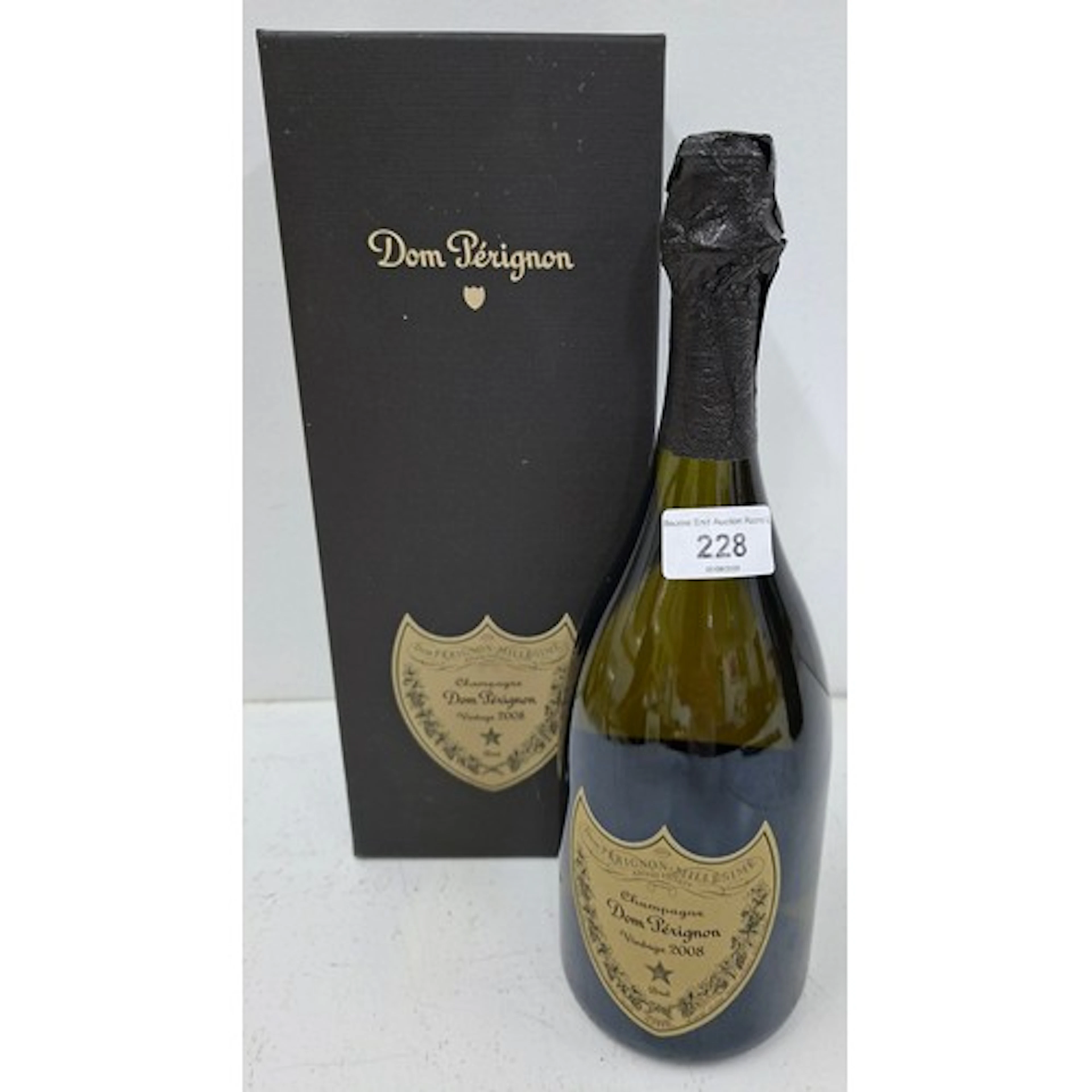 A boxed bottle of 2008 Vintage Dom Perignon champagne. Locat...