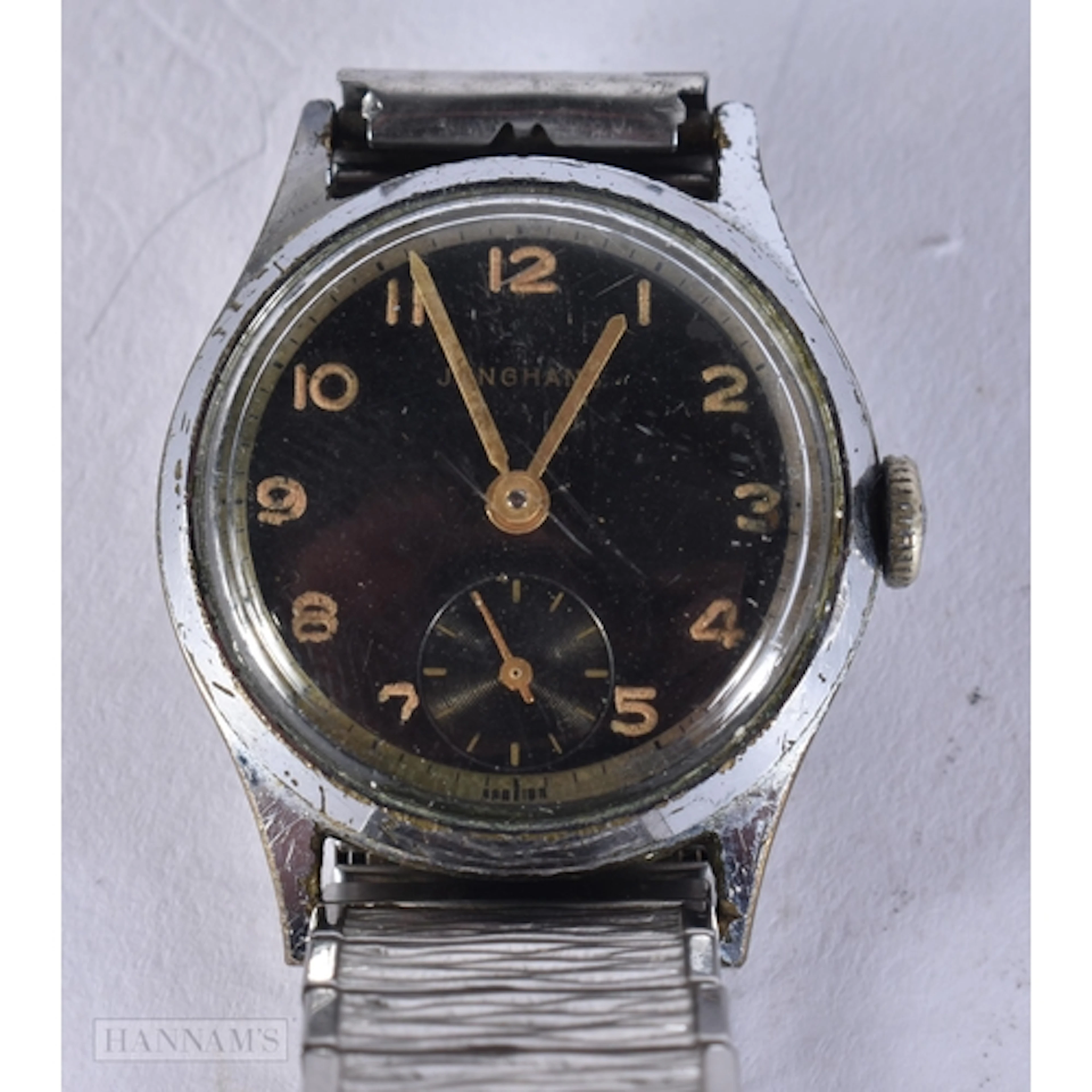 A JUNGHANS MILITARY WATCH. 2.9 cm including crown. not runni...