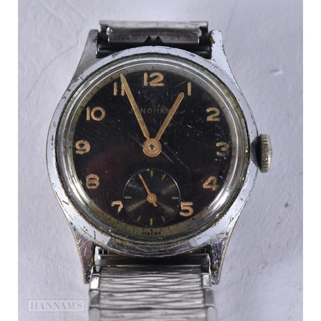 A JUNGHANS MILITARY WATCH. 2.9 cm including crown. not runni...