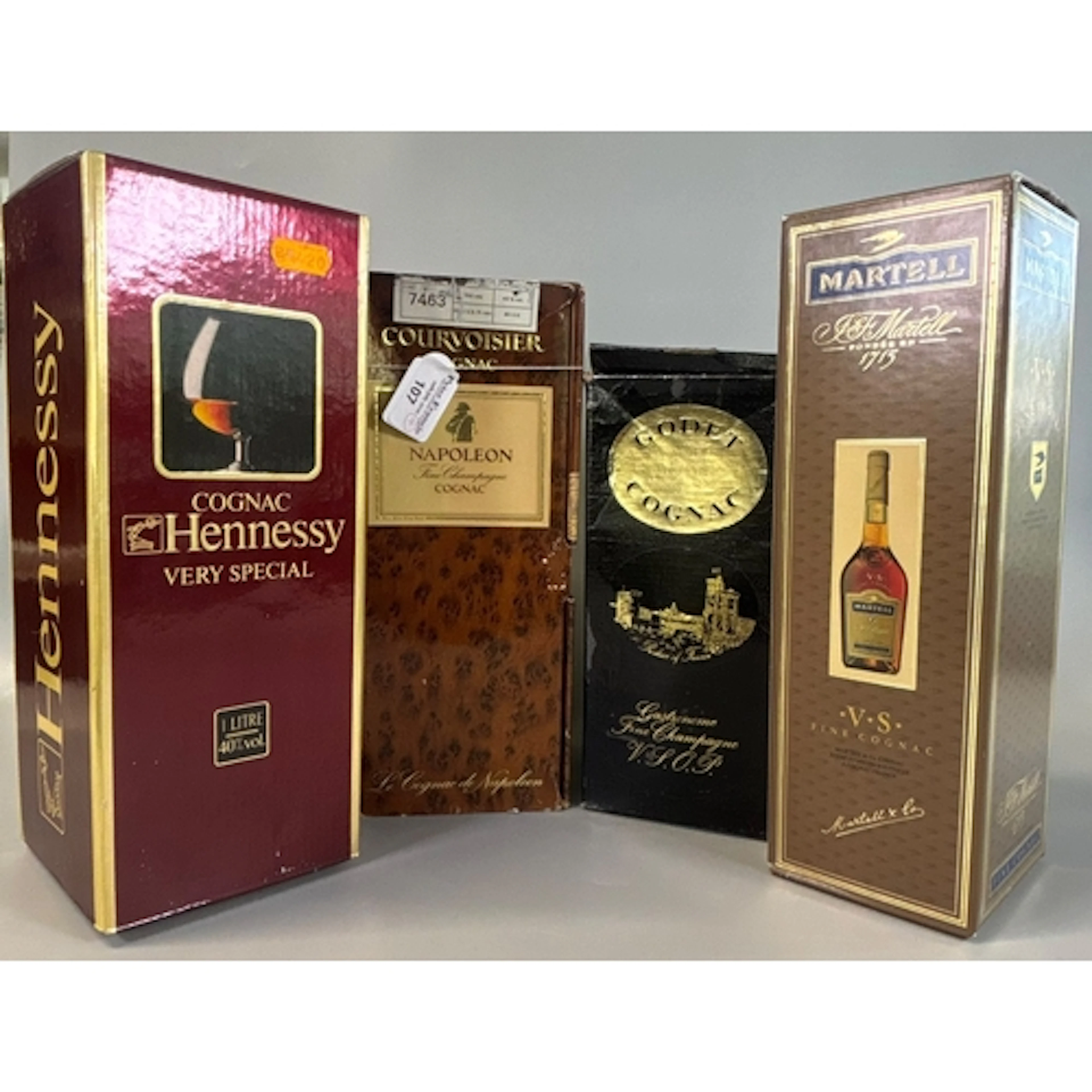 Four bottles of assorted Cognac to include: Courvoisier Napo...